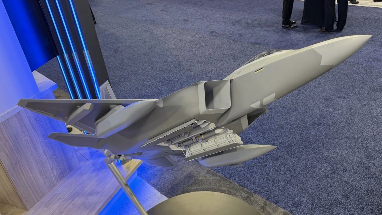 Lockheed Martin has presented a scale model of the new-look F-22 Raptor fitted with stealthy external fuel tanks and underwing infrared sensor pods. Up to this point, the fuel tanks had been seen in renderings as well as at least one long-distance photo that revealed little in the way of details. The sensor pods had previously been seen at closer quarters during flight testing, as you can read about here.