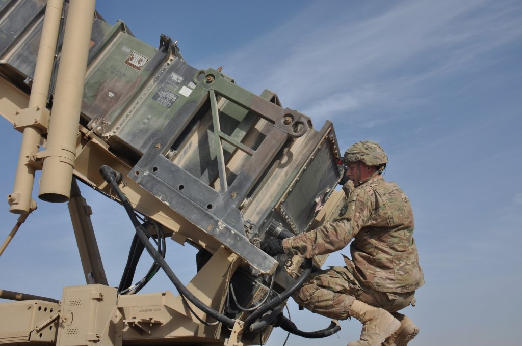 Pfc. James Weaver, 1-62 Delta Battery Air Defense Artillery Regiment Patriot station launcher operator and maintainer from Steelville, Mo., unlocks torque tubes behind a PAC-2 missile interceptor during an operational readiness exercise at Al Udeid Air Base, Qatar, March 4. The Patriot missiles at AUAB protect the base from a variety of airborne threats including tactical ballistic missiles and drones. (U.S. Air Force photo by Tech. Sgt. James Hodgman/Released)