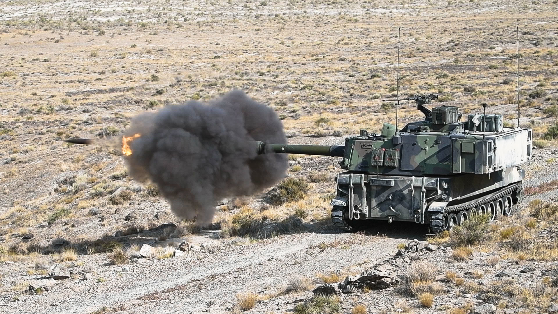 Soldiers fire round from M901 Paladin during a live-fire exercise at Dugway Proving Ground, Utah, Sep. 17, 2020. Utah National Guard men and women with 2nd Battalion, 222nd Field Artillery traveled to Dugway Proving Ground to participate in their annual training exercise. (Utah Army National Guard photo by Sgt. Jordan Hack)