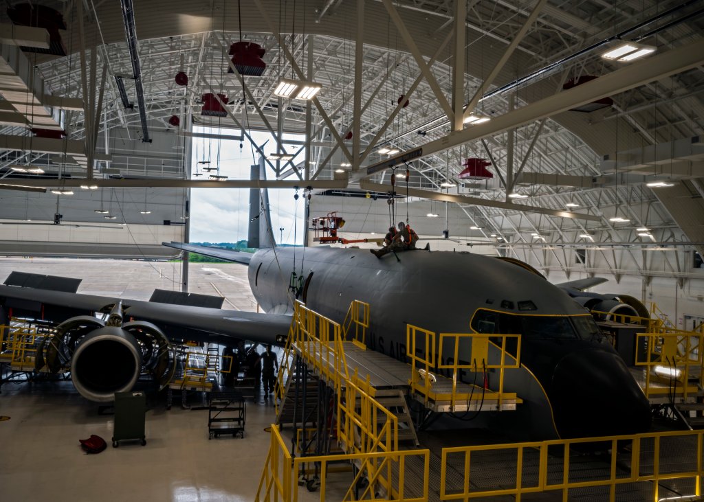 Two Guardsmen from the 171st Maintenance Group, 171st Air Refueling Wing, Pennsylvania Air National Guard, work on top of a KC-135 Stratotanker aircraft while it undergoes an isochronal inspection Aug. 17, 2021, in Pittsburgh, Pennsylvania. (U.S. Air National Guard photo by Staff Sgt. Zoe M. Wockenfuss)