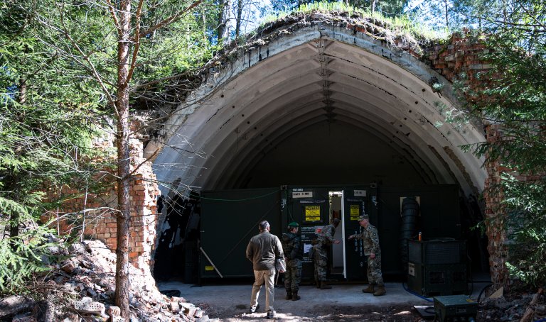 A field medical laboratory belonging to the 512th Field Hospital sits inside an old Soviet-era bunker as part of Exercise Dynamic Employment of Forces to Europe for NATO Deterrence and Enhanced Readiness (DEFENDER) 2025, Vepriai Rocket Base, Lithuania, May 12, 2025. During Swift Response, the initial phase of DEFENDER 25, the Defense Health Agency’s Force Health Protection team is providing essential support and expertise to U.S. Army medical providers assigned to the 512th Field Hospital, 519th Hospital Center, 30th Medical Brigade, and 68th Theater Medical Command. As part of DHA’s Operational Medical Systems Program Management Office, FHP works with combatant commands and regulatory experts across the globe to rapidly provide a treatment, diagnostic, or preventive medical countermeasure against high-consequence threats to the Warfighter when a Food and Drug Administration-approved product is not available. (Defense Health Agency Photo by T. T. Parish/Released)