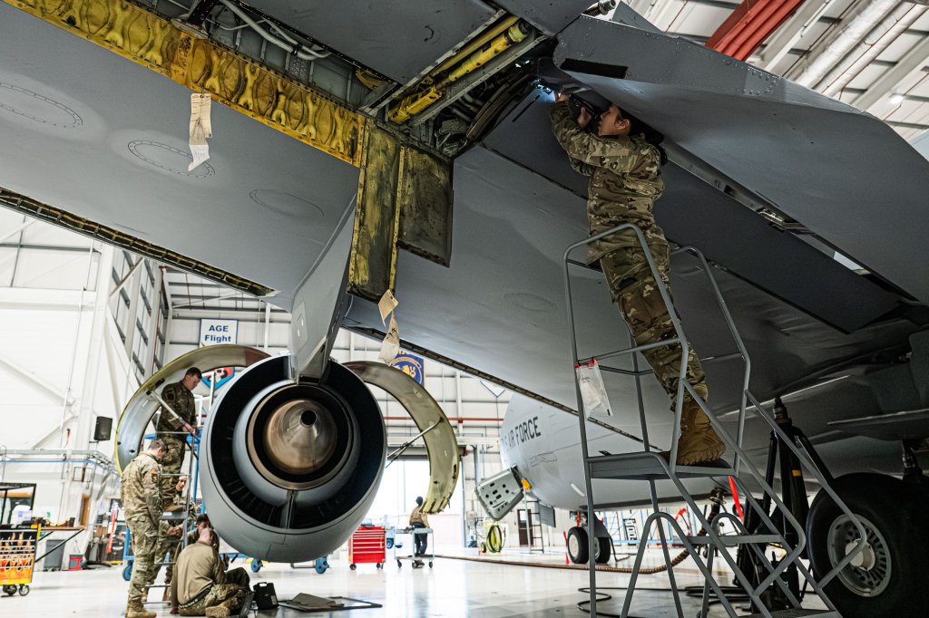 U.S. Air Force 100th Maintenance Squadron, aircraft maintainers conduct maintenance on the KC-135 Stratotanker at RAF Mildenhall, England, Dec. 10, 2025. Aircraft maintainers play a critical role in ensuring the KC-135 fleet remains mission-ready to support air refueling operations across the European theater. (U.S. Air Force photo by Airman 1st Class Iris Carpenter)