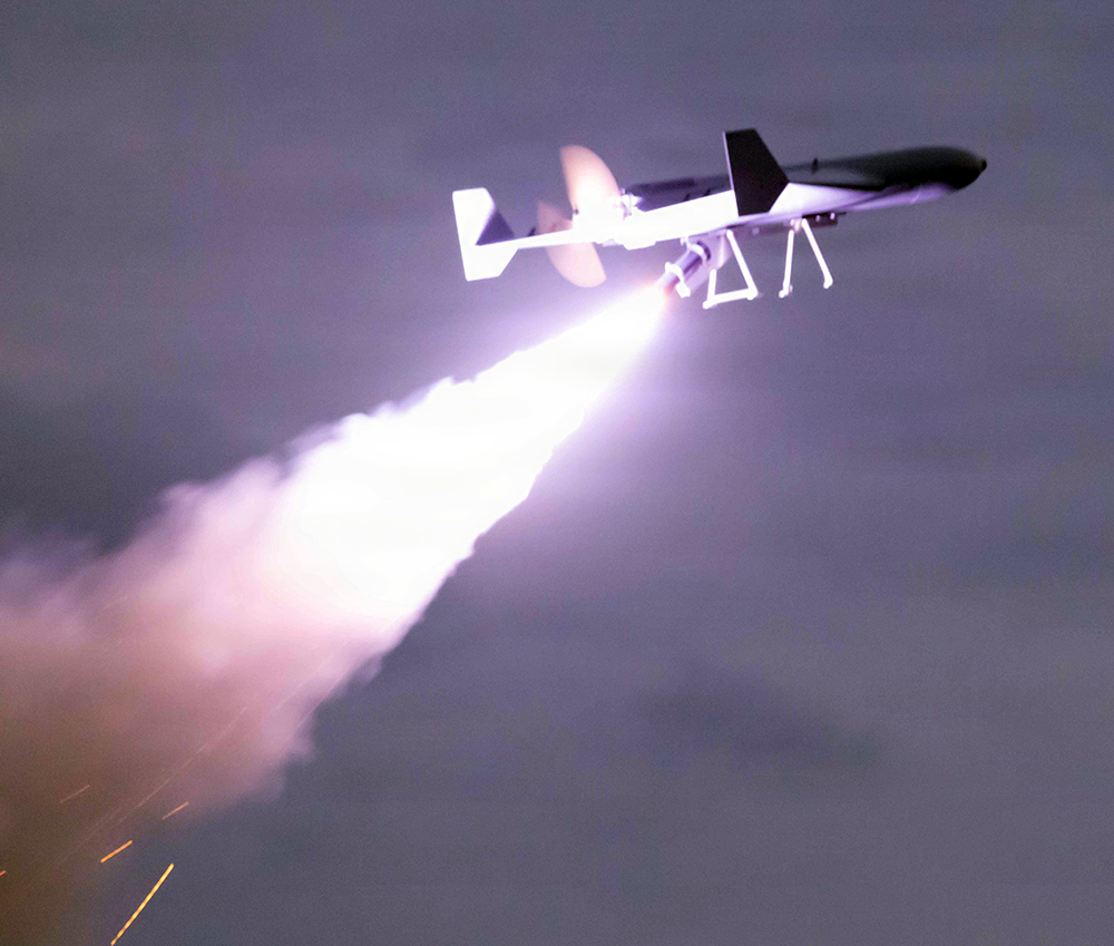 A Low-cost Unmanned Combat Attack System (LUCAS) launches from the flight deck of the Independence-class littoral combat ship USS Santa Barbara (LCS 32) while operating in the Arabian Gulf, Dec. 16, 2025. Prior to the launch, shipboard weapons integration assessments helped ensure the system could be safely stored, moved, and handled at sea. Task Force 59 operated the LUCAS drone as part of Task Force Scorpion Strike operations. (U.S. Army photo by Spc. Kayla McGuire)