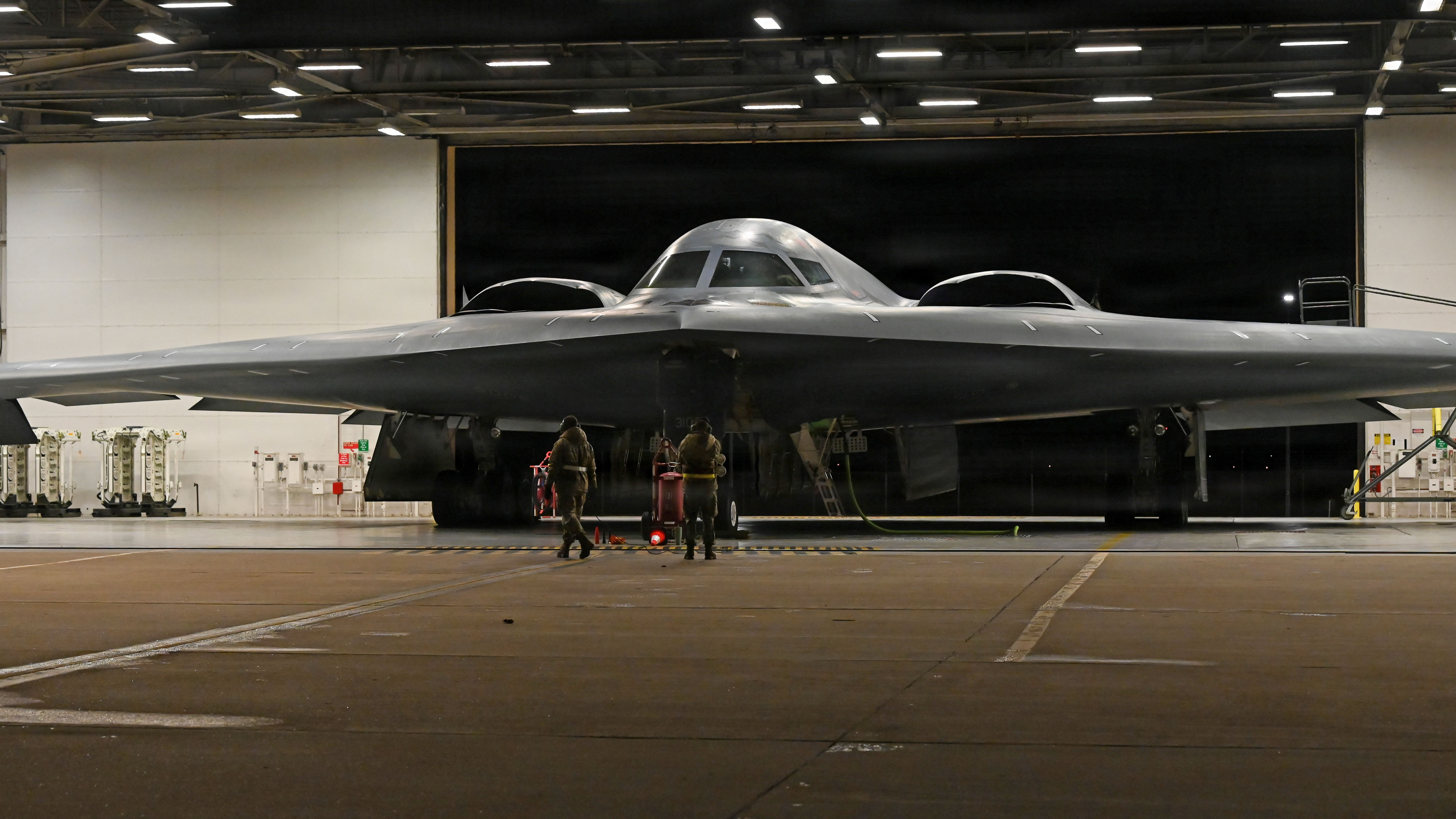 U.S. Air Force crew chiefs perform pre-flight checks on a B-2 Spirit stealth bomber during Operation Epic Fury, March 17, 2026. (U.S. Air Force photo)