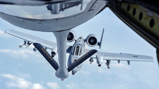 A KC-135T Stratotanker from the 171st Aerial Refueling Squadron of the 127th Wing at Selfridge Air National Guard Base, Michigan, readies to refuel an A-10C from the 107th Fighter Squadron, also from Selfridge, on an aerial refueling sortie June 27, 2023. In addition to routine aerial refueling training in all conditions, aircraft from the 127th Wing commemorated the 100-year anniversary of the first aerial refueling conducted on June 27, 1923.