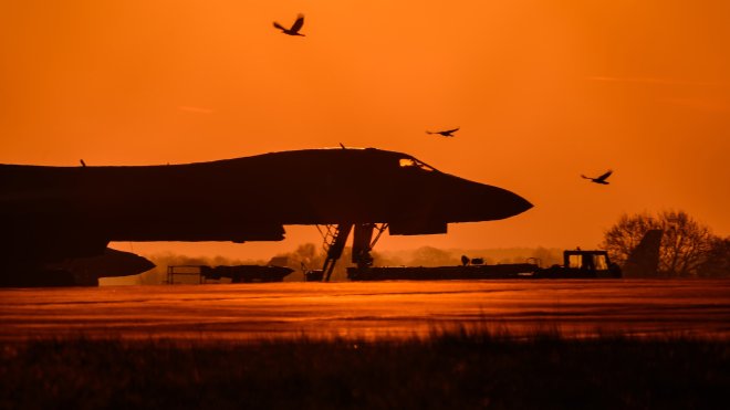 FAIRFORD, ENGLAND - MARCH 19: A Rockwell B-1 Lancer heavy bomber sits on the tarmac during sunrise at RAF Fairford on March 19, 2026 in Fairford, England. Since UK Prime Minister Keir Starmer back-tracked on his initial refusal to allow the U.S. to use British bases to launch defensive strikes against Iranian missile sites, a variety of U.S. military aircraft, including B52 and B-1 bombers, have been spotted at RAF Fairford in Gloucestershire.