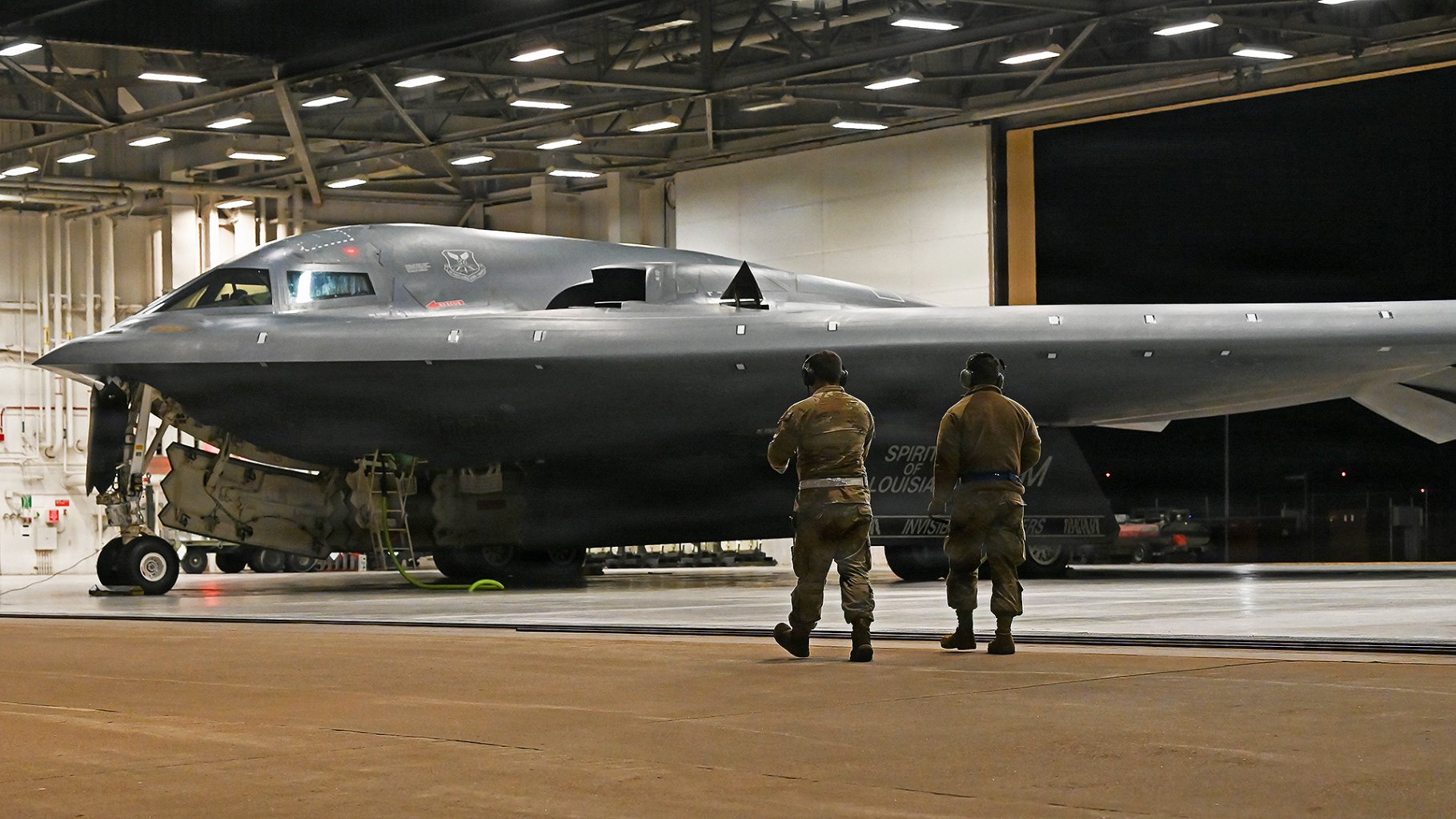U.S. Air Force crew chiefs perform pre-flight checks on a B-2 Spirit stealth bomber during Operation Epic Fury, March 17, 2026. (U.S. Air Force photo)