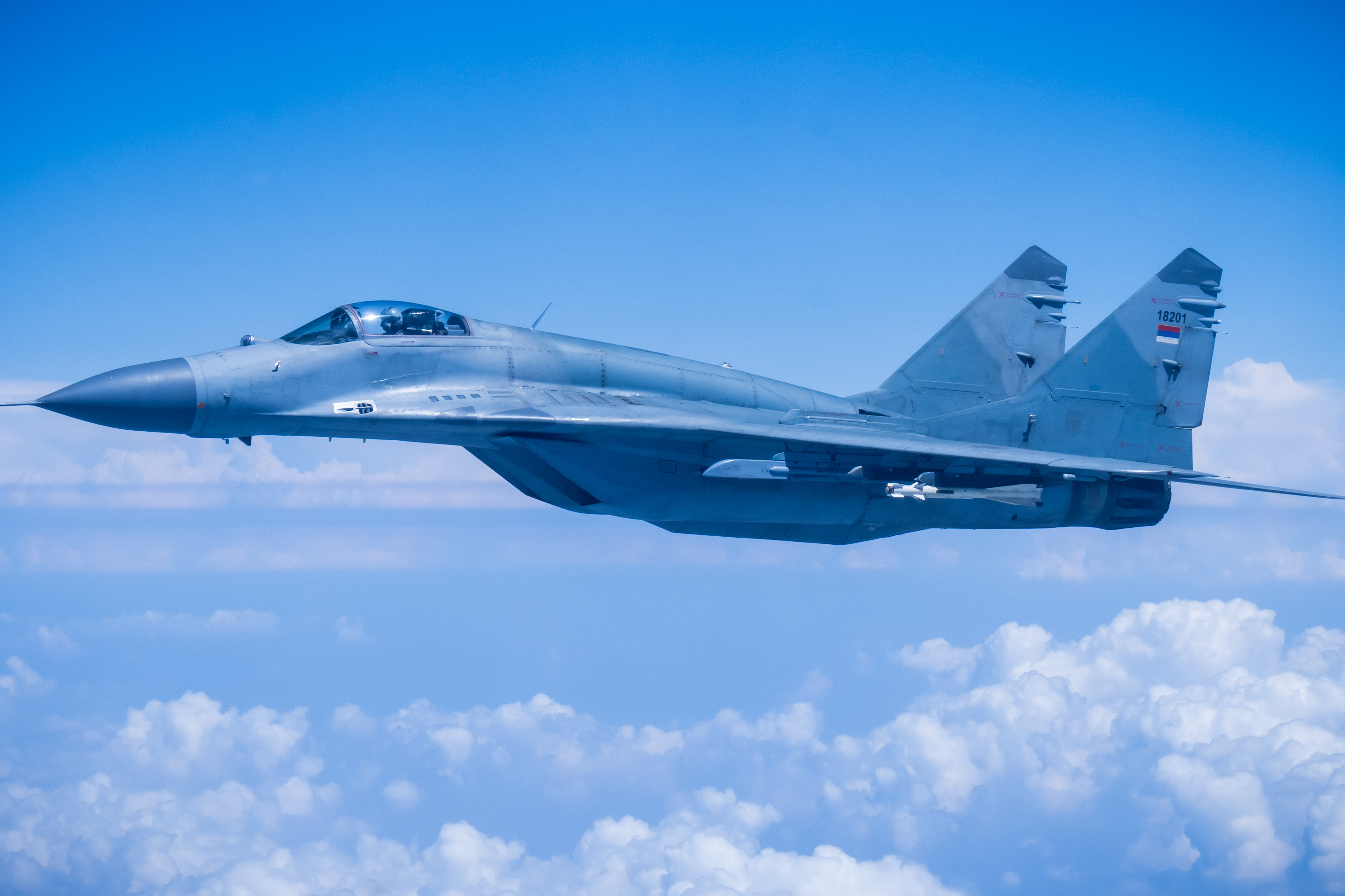 19 July 2024, Serbia, Belgrad: A MIG-29 jet of the Serbian Air Force accompanies the Airbus of Federal Chancellor Scholz (SPD) after a visit to the President of Serbia Vucic and a summit meeting on critical raw materials. Photo: Michael Kappeler/dpa (Photo by Michael Kappeler/picture alliance via Getty Images)