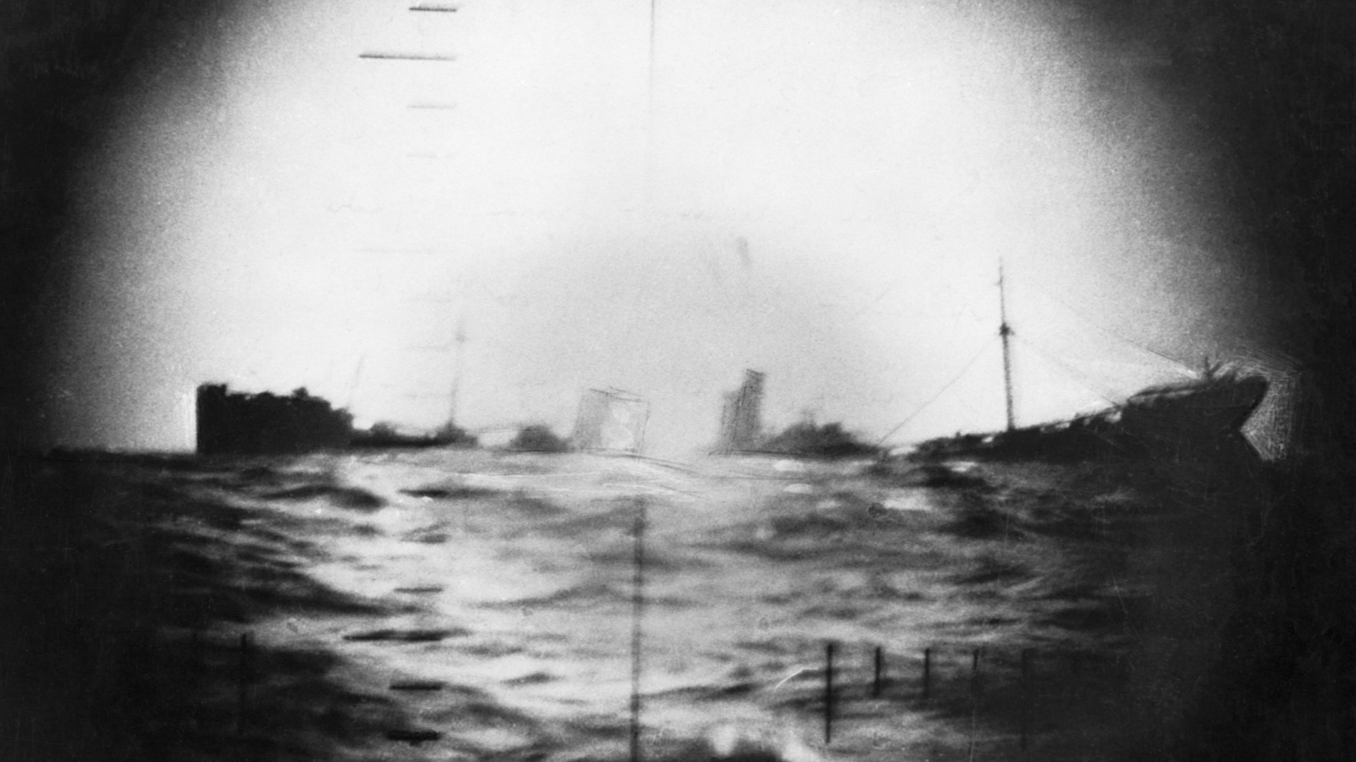 A submarine attack by the USS Thresher (commanded by Commander W.J. Millican) has broken the back of this Japanese ship, hitting amidships. It is about to sink.