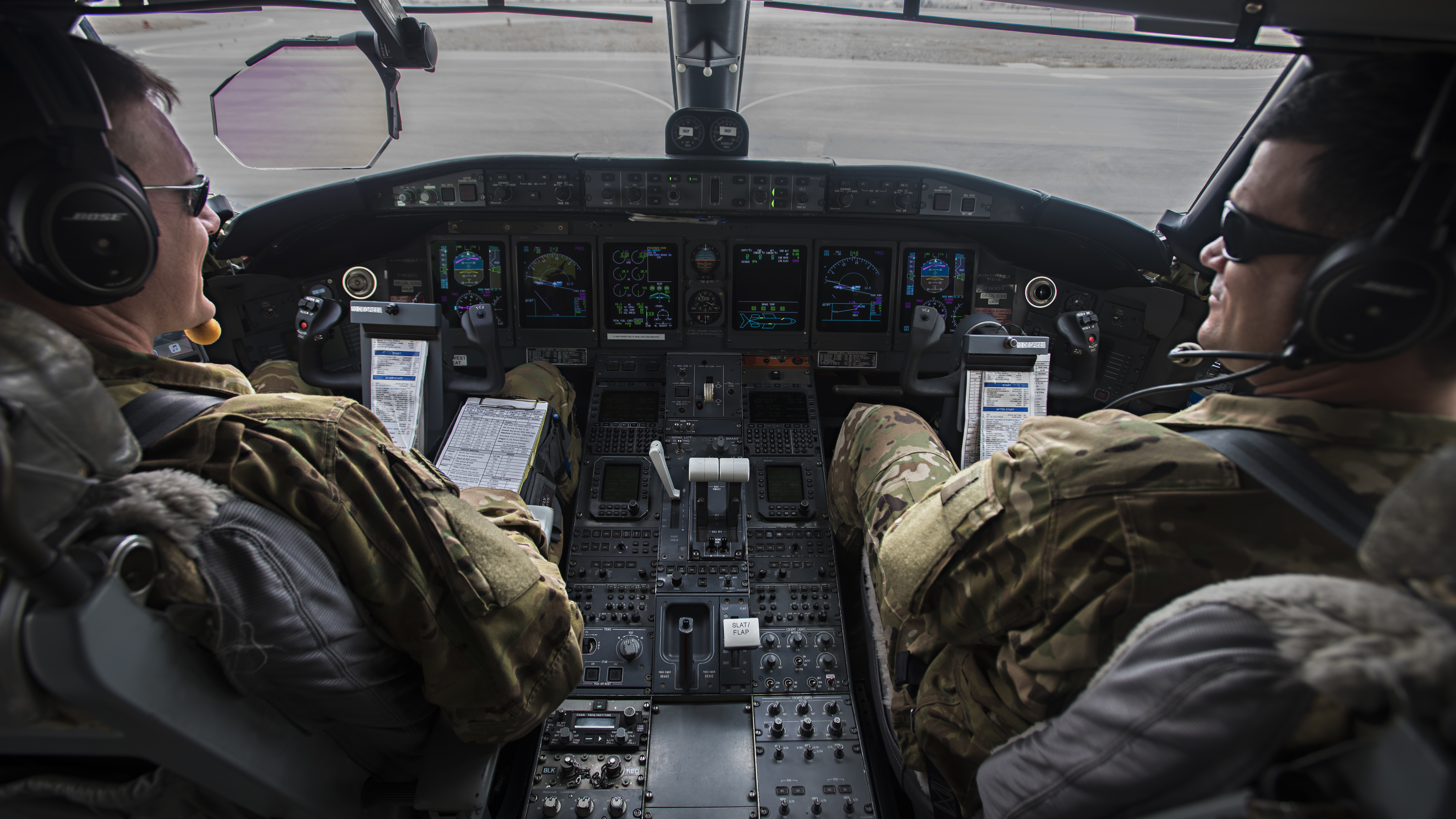 Lt. Col. Chris and Maj. Matt, 430th Expeditionary Electronic Combat Squadron, prepare to fly the Battlefield Airborne Communications Node’s 10,000th mission in the E-11A aircraft, Feb. 24, 2017. The BACN weapons system was developed to fulfill an urgent need in Afghanistan where the mountainous terrain makes communication difficult. (U.S. Air Force photo by Staff Sgt. Katherine Spessa)