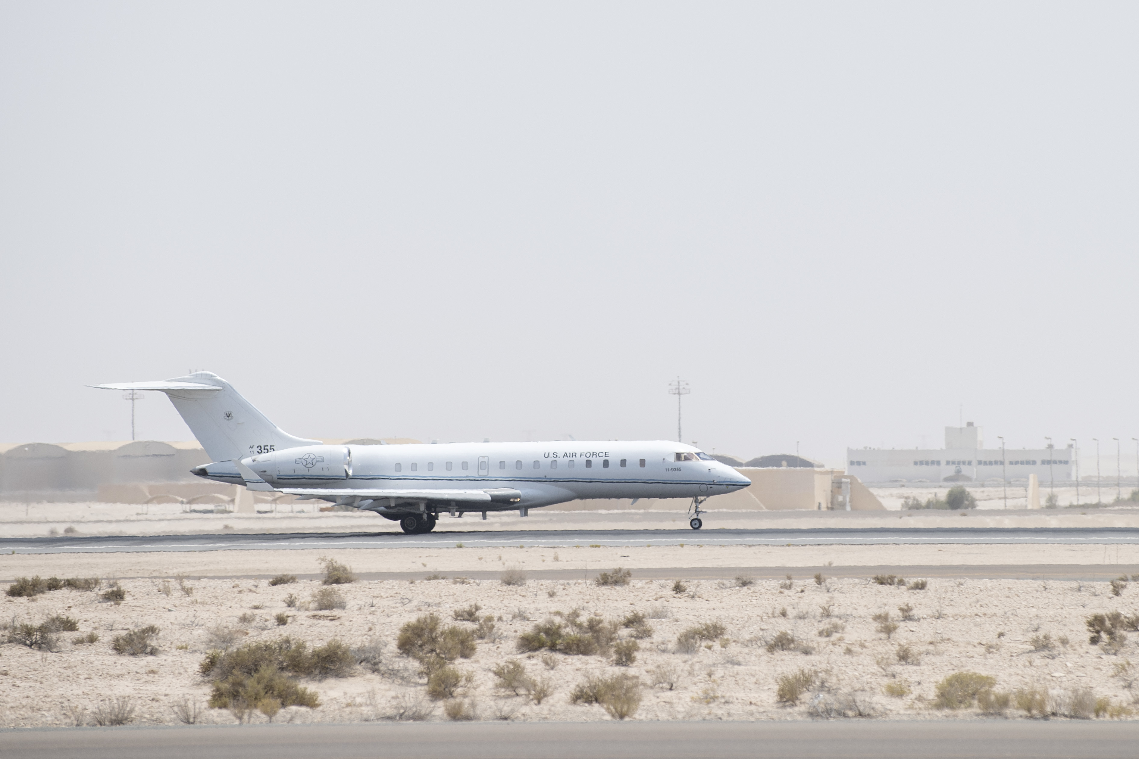 A U.S. Air Force E-11A Battlefield Airborne Communications Node aircraft, assigned to the 430th Expeditionary Electronic Combat Squadron, takes off in support of a joint, multi-national exercise at Al Dhafra Air Base (ADAB), United Arab Emirates, June 30, 2021. During the exercises, multiple platforms worked together to execute and refine tactics, techniques and procedures to counter Unmanned Aerial System threats. Conducting consistent training with partner nations ensures interoperability and the ability to defend ourselves, and reinforces security and stability in the region. (U.S. Air Force photo by Master Sgt. Wolfram M. Stumpf)