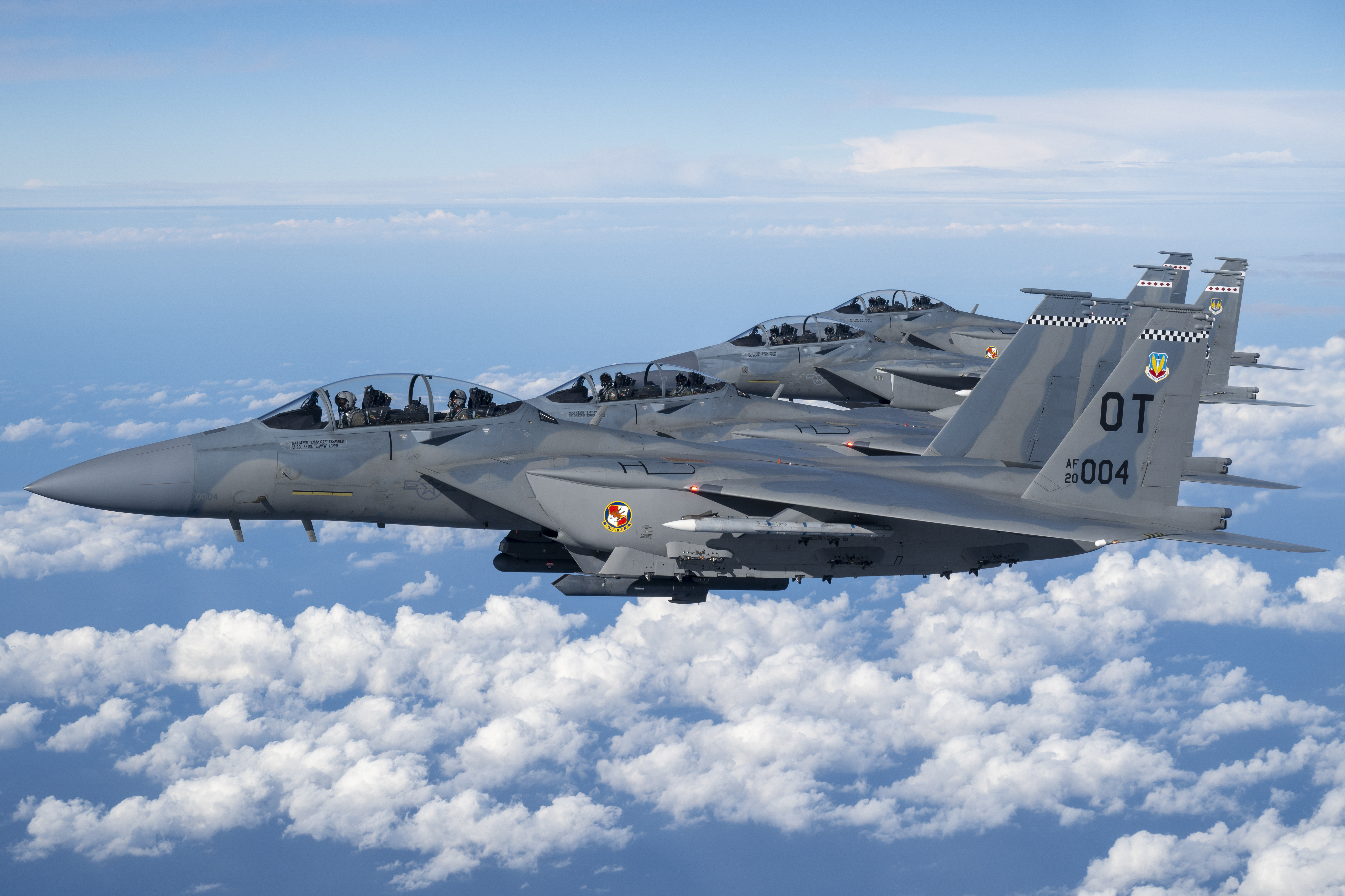 A formation of four U.S. Air Force F-15EX Eagle II fighter jets, assigned to Eglin Air Force Base, Florida, fly over the Gulf of America, Nov. 21, 2025. Secretary of the Air Force Troy Meink flew in the backseat of the lead jet as part of his visit to Eglin AFB. The flight oriented Meink to F-15EX tactics, techniques and procedures being developed and advanced by the 53d Wing to include weapons capacity, next-gen survivability, and next-generation radars, sensors and networking capabilities. (U.S. Air Force photo by Staff Sgt. Blake Wiles)