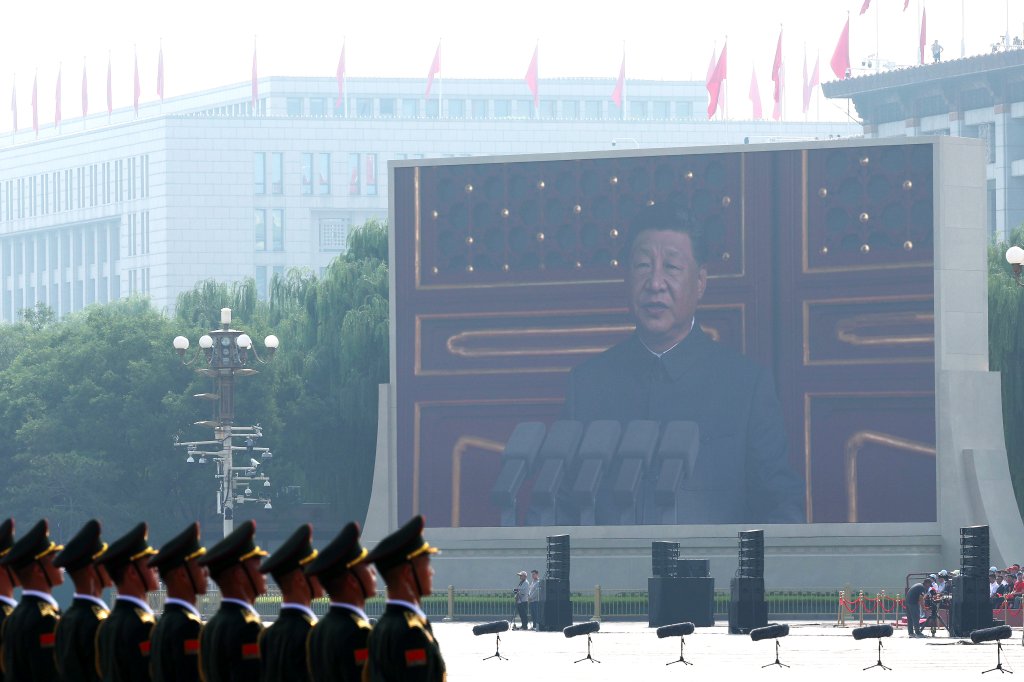 BEIJING, CHINA - SEPTEMBER 03: A display shows China’s President Xi Jinping delivering a speech during a military parade marking the 80th anniversary of victory over Japan and the end of World War II, in Tiananmen Square on September 03, 2025, in Beijing, China. China's Victory Day military parade serves as a powerful display of national pride and military power. This year's parade carries heightened geopolitical weight with the attendance of leaders like Vladimir Putin, Kim Jong Un and Masoud Pezeshkian, underlining China's diplomatic alliances as it presents itself as an alternative global leader. (Photo by Lintao Zhang/Getty Images)