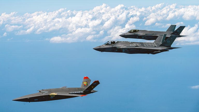 A U.S. Marine Corps XQ-58A Valkyrie, highly autonomous, low-cost tactical unmanned air vehicle, conducts its second test flight with two U.S. Air Force F-35A Lightning II aircraft assigned to 33rd Fighter Wing, 96th Test Wing at Eglin Air Force Base, Fla., Feb. 23, 2023. The XQ-58A Valkyrie test flight and the data collected inform future requirements for the Marine Corps in a rapidly evolving security environment, while successfully fueling joint innovation and experimentation opportunities. (U.S. Air Force photo by Master Sgt. John McRell)