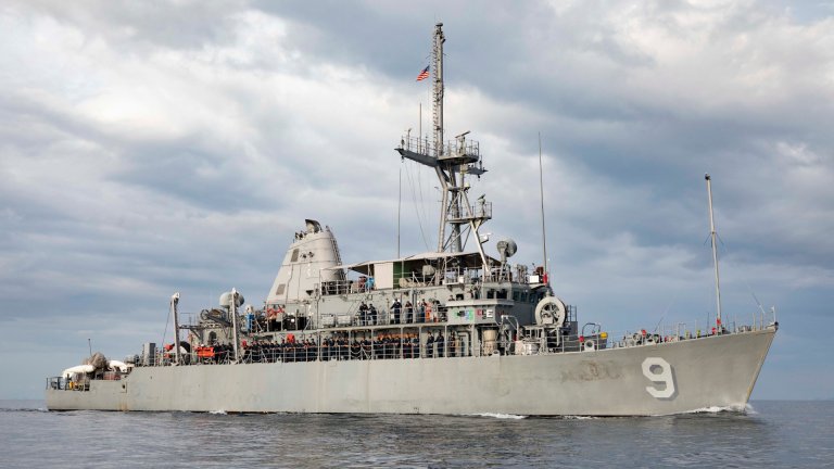 A flurry of activity by American minesweeping vessels in the Pacific comes as the U.S. military has said it is sending additional forces to help clear Iranian mines from the Strait of Hormuz.