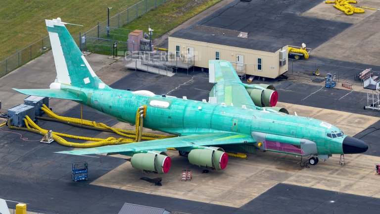 A photographer on a flight over Greenville, Texas, captured an especially good look at one of the U.S. Air Force's RC-135V/W Rivet Joint aircraft with its usual paint scheme completely stripped off.