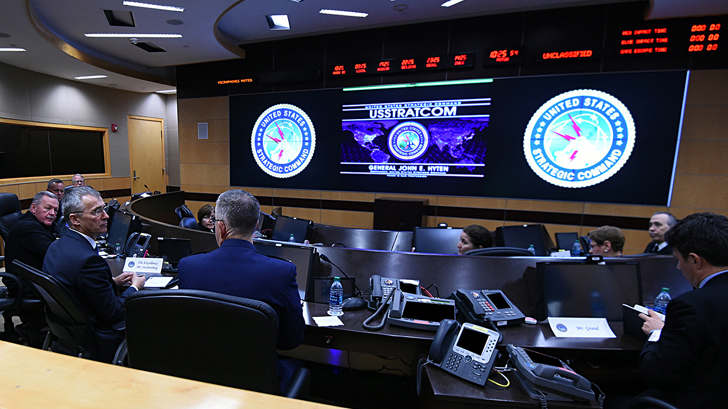 NATO Secretary General Jens Stoltenberg receives a brief from U.S. Air Force Gen. John Hyten, commander of U.S. Strategic Command (USSTRATCOM), during an orientation of the command’s battle deck at Offutt Air Force Base, Neb., April 6, 2018. During his visit, Stoltenberg toured the command’s global operations center and participated in discussions with Hyten, other senior leaders and subject matter experts on the continuing U.S. commitment to supporting NATO and allies. (U.S. Navy photo by Mass Communication Specialist 1st Class Julie R. Matyascik)