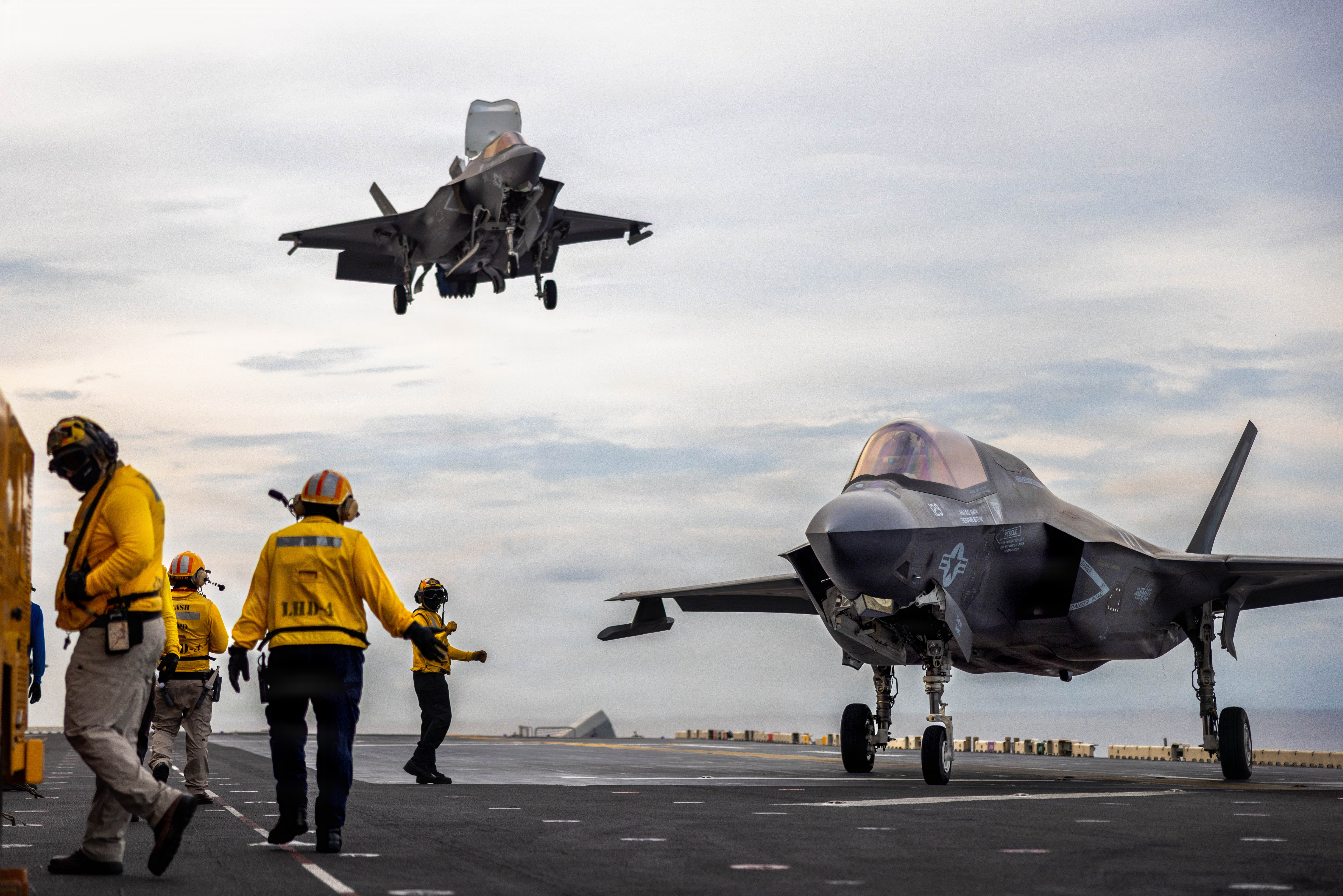 U.S. Marine Corps F-35B Lightning II assigned to Marine Fighter Attack Squadron (VMFA) 122, 11th Marine Expeditionary Unit, land during flight operations aboard Wasp-class amphibious assault ship USS Boxer (LHD 4) in the Pacific Ocean, May 2, 2026. The 11th MEU, embarked aboard the Boxer Amphibious Ready Group, is a persistent, combat credible force contributing to deterrence and crisis response in the U.S. 7th Fleet area of operations. U.S. 7th Fleet, the U.S. Navy's largest forward-deployed numbered fleet, routinely interacts and operates with allies and partners to preserve a free and open Indo-Pacific. (U.S. Marine Corps photo by Sgt. Trent A. Henry)