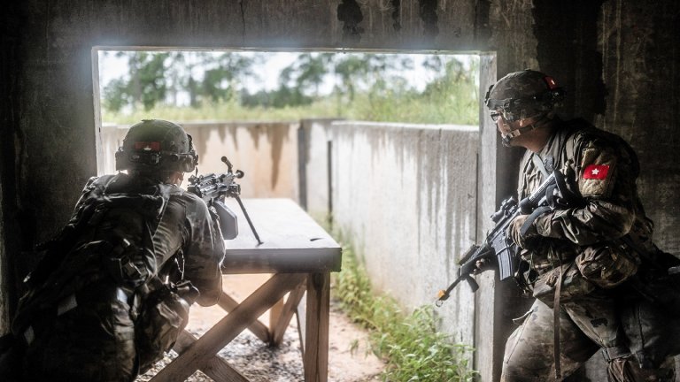Soldiers with Bravo Company, Task Force Guardian, 41st Infantry Brigade Combat Team, secure a bunker in an enemy fortified entrenchment during the initial phase of combat operations as part of an exercise during the Joint ReadinessTraining Center (JRTC) rotation 24-09 at Fort Johnson, La., July 18, 2024. Task Force Guardian is comprised of personnel from 2nd Battalion, 162nd Infantry; 1st Battalion, 186th Infantry; and the 141st Brigade Support Battalion. The JRTC goal is to create realistic environments that help prepare units for complex operations. (Oregon Army National Guard photo by 1st Sgt. Zachary Holden, 115th Mobile Public Affairs Detachment)