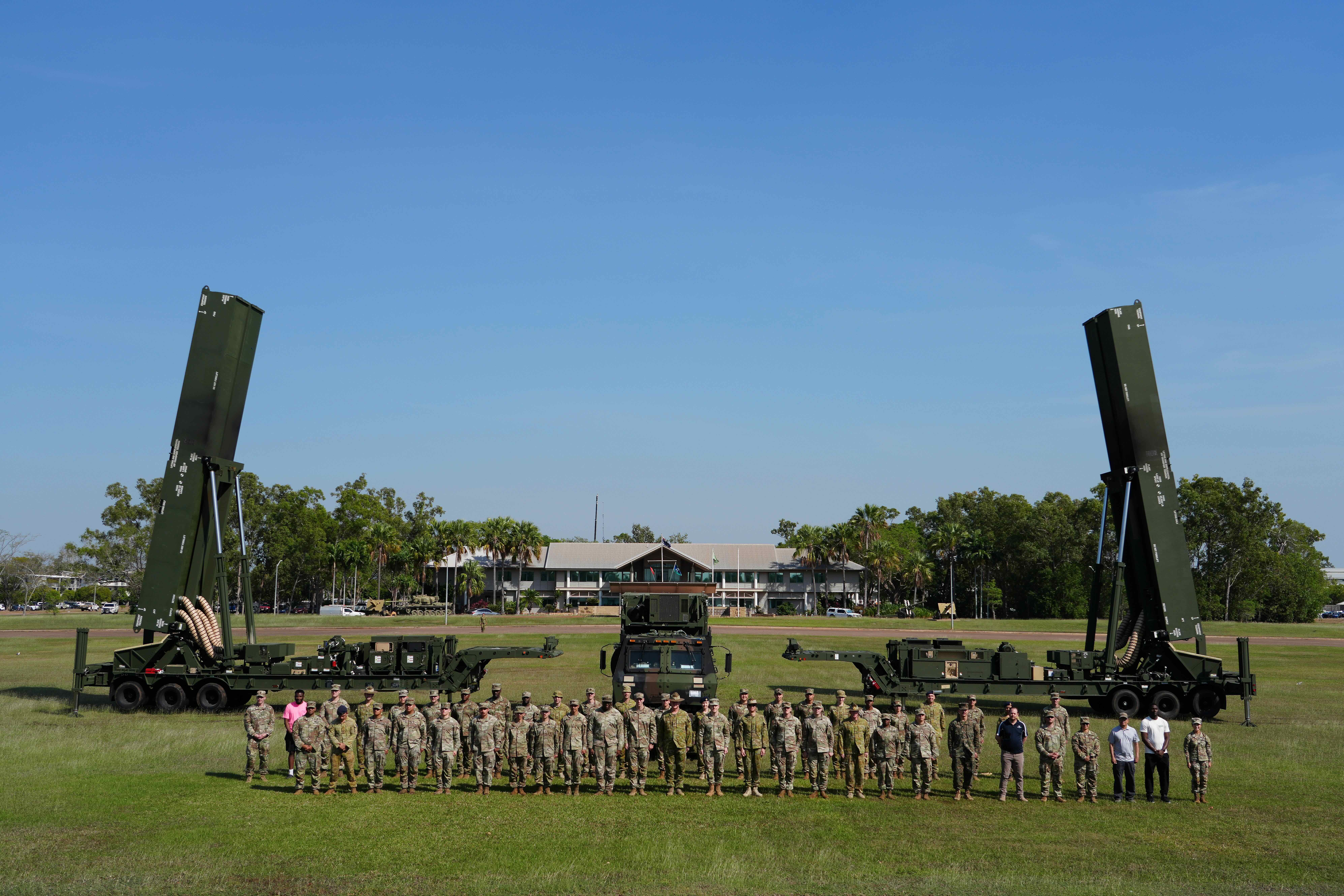 NORTHERN TERRITORY, Australia — Service members from the U.S. Department of Defense and the Australian Defence Force pose with the Long Range Hypersonic Weapon System in Northern Territory, Australia, July 9, 2025. The Dark Eagle and its crew are participating in Exercise Talisman Sabre 25, a bilateral exercise with multinational participation hosted by Australia in partnership with U.S. Indo-Pacific Command. This marks the first operational employment of the Dark Eagle outside the continental United States. Talisman Sabre is the largest bilateral military exercise between Australia and the United States, strengthening interoperability and partnership through combined training and operations. (U.S. Army photo by Sgt. Perla Alfaro)