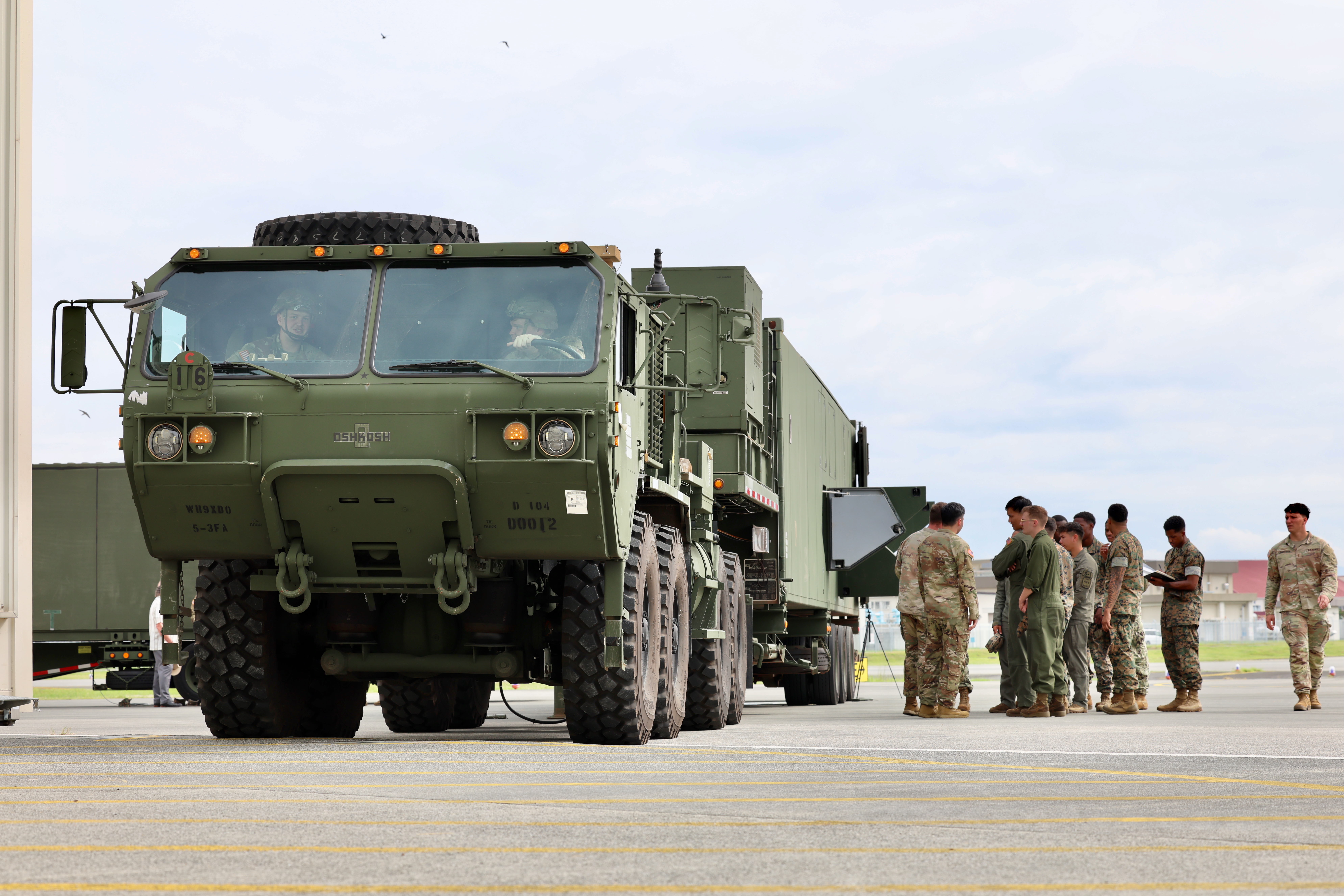 U.S. Marines and Sailors observe and familiarize themselves with the U.S. Army’s Typhon missile system during a training opportunity at Marine Corps Air Station Iwakuni, Japan, Sept. 12, 2025. The hands-on session allowed personnel from various units to learn about the system’s capabilities as part of Resolute Dragon 25, an annual bilateral exercise across Japan, including the Southwest Islands, that strengthens the command, control and multi-domain maneuver capabilities of the III Marine Expeditionary Force and the Japan Ground Self-Defense Force’s Western Army personnel with a focus on controlling and defending key maritime terrain. (U.S. Army photo by Sgt. Perla Alfaro)