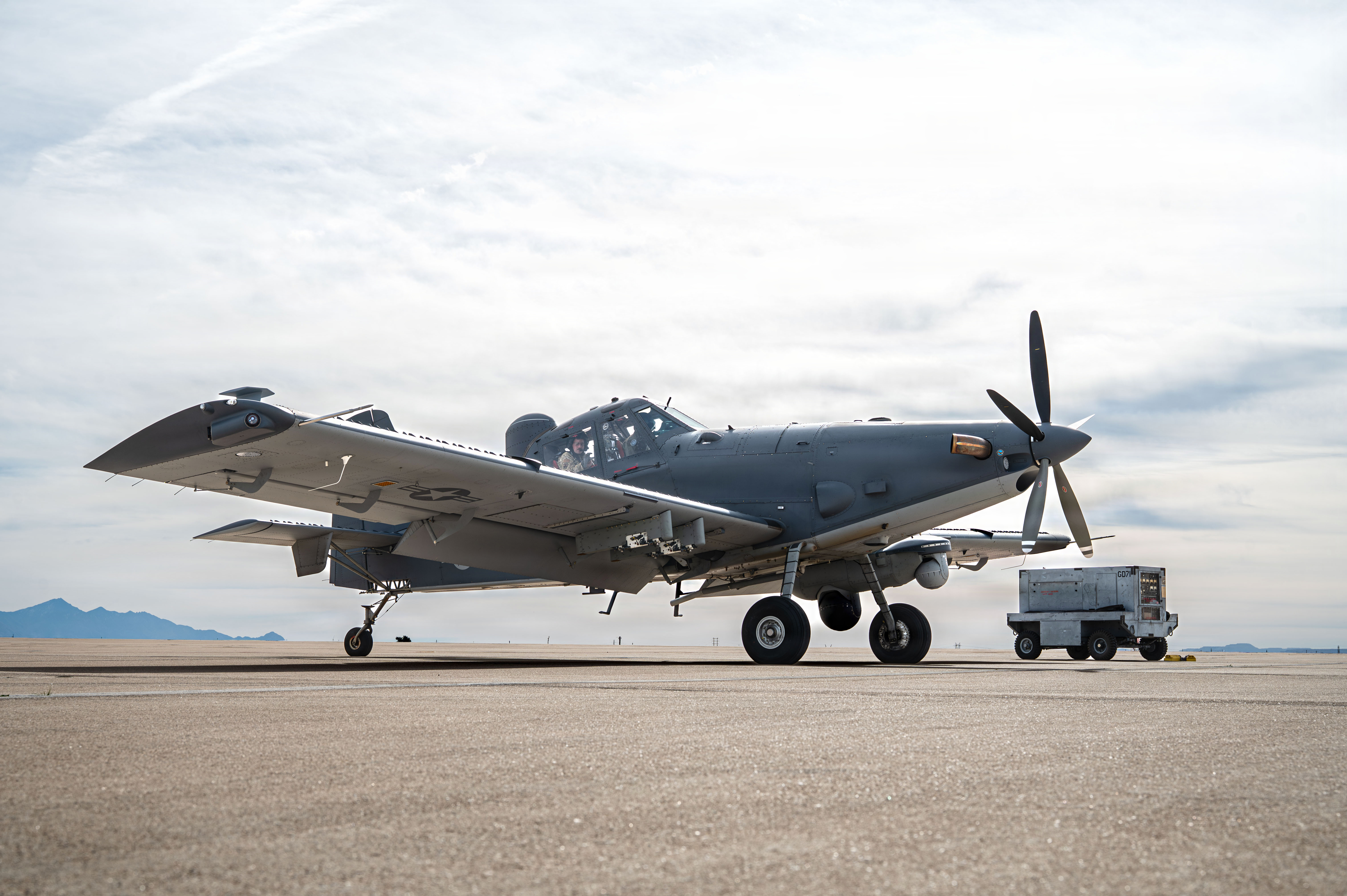 U.S. Air Force Col. Charles Redmond, 355th Wing deputy commander, and a pilot assigned to the 492nd Special Operations Wing prepare to take off in an OA-1K Skyraider II aircraft at Davis-Monthan Air Force Base, Arizona, Jan. 21, 2026. Redmond participated in a familiarization flight to better understand the Skyraider II’s mission set and capabilities, enhancing mission readiness. (U.S. Air Force photo by Senior Airman Jasmyne Bridgers-Matos)