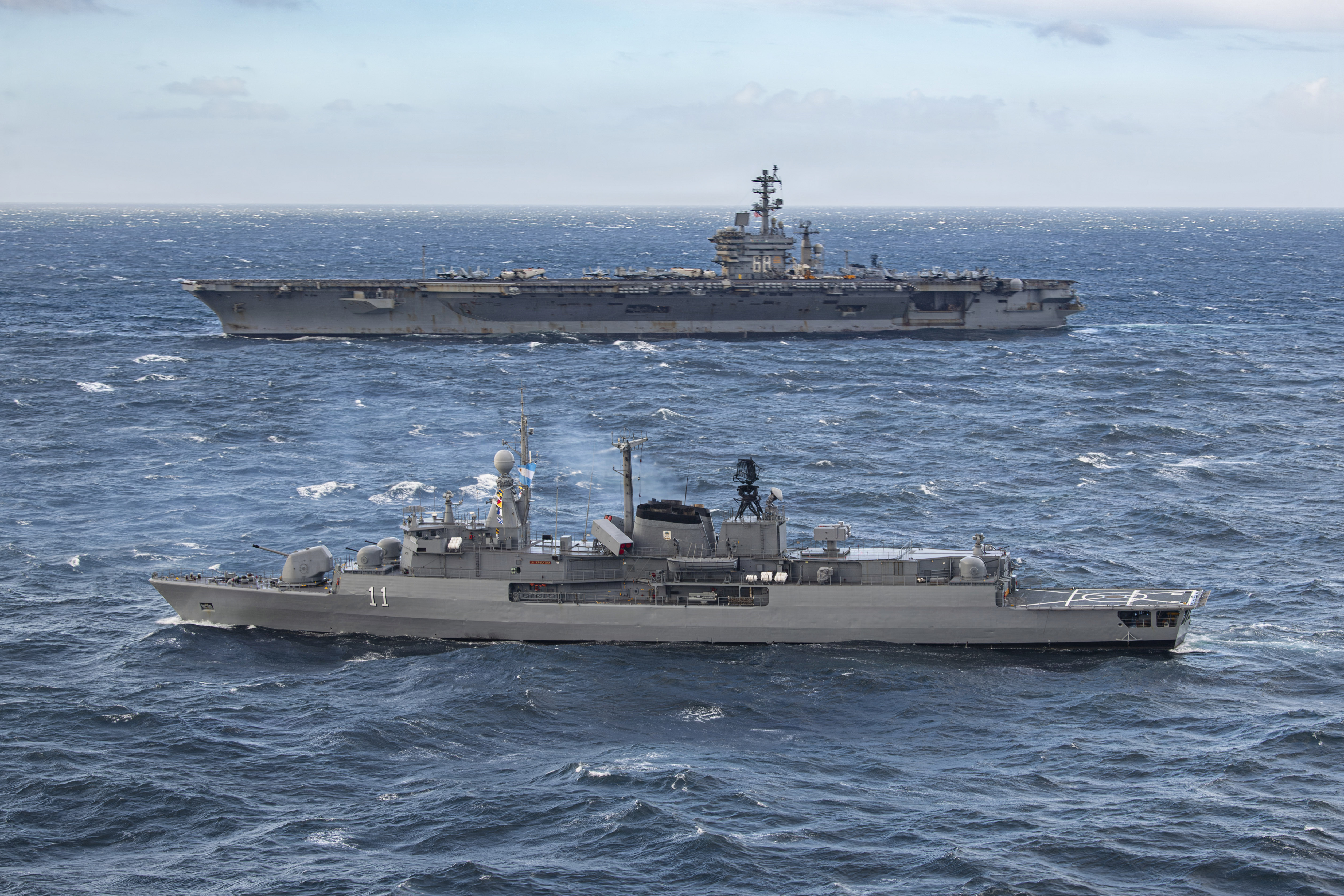 Argentine Navy Almirante Brown-class destroyer ARA La Argentina (DD 11) steams alongside U.S. Navy Nimitz-class aircraft carrier USS Nimitz (CVN 68) during a bilateral maritime engagement in the Atlantic Ocean, April 29, 2026. Nimitz is deployed as part of Southern Seas 2026, which seeks to enhance capability, improve interoperability, and strengthen maritime partnerships with countries throughout the region through joint, multinational, and interagency exchanges and cooperation. (U.S. Navy photo by Mass Communication Specialist 2nd Class Peter K. McHaddad)