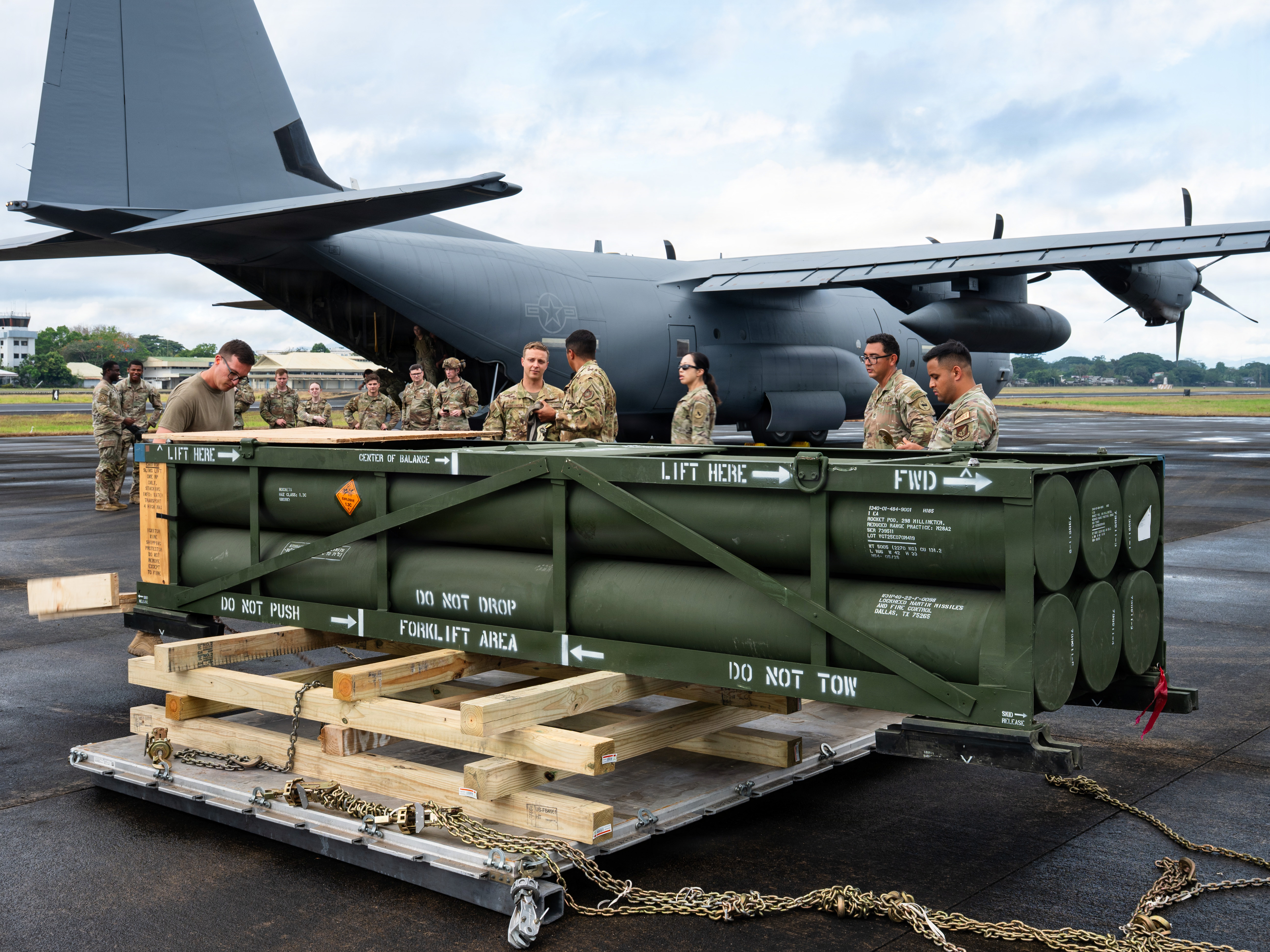 U.S. Airmen assigned to the 317th Airlift Wing and 21st Air Task Force and U.S. Soldiers assigned to U.S. Army Pacific prepare a U.S. Army Guided Multiple Launch Rocket System pod for transport in support of Exercise Balikatan 2026 at Puerto Princesa, Palawan, Philippines, April 29, 2026. Balikatan is a longstanding annual exercise between the Armed Forces of the Philippines and U.S. military that represents the strength of our alliance, improves our capable combined force, and demonstrates our commitment to regional peace and prosperity. (U.S. Air Force photo by Senior Airman Jade M. Caldwell)