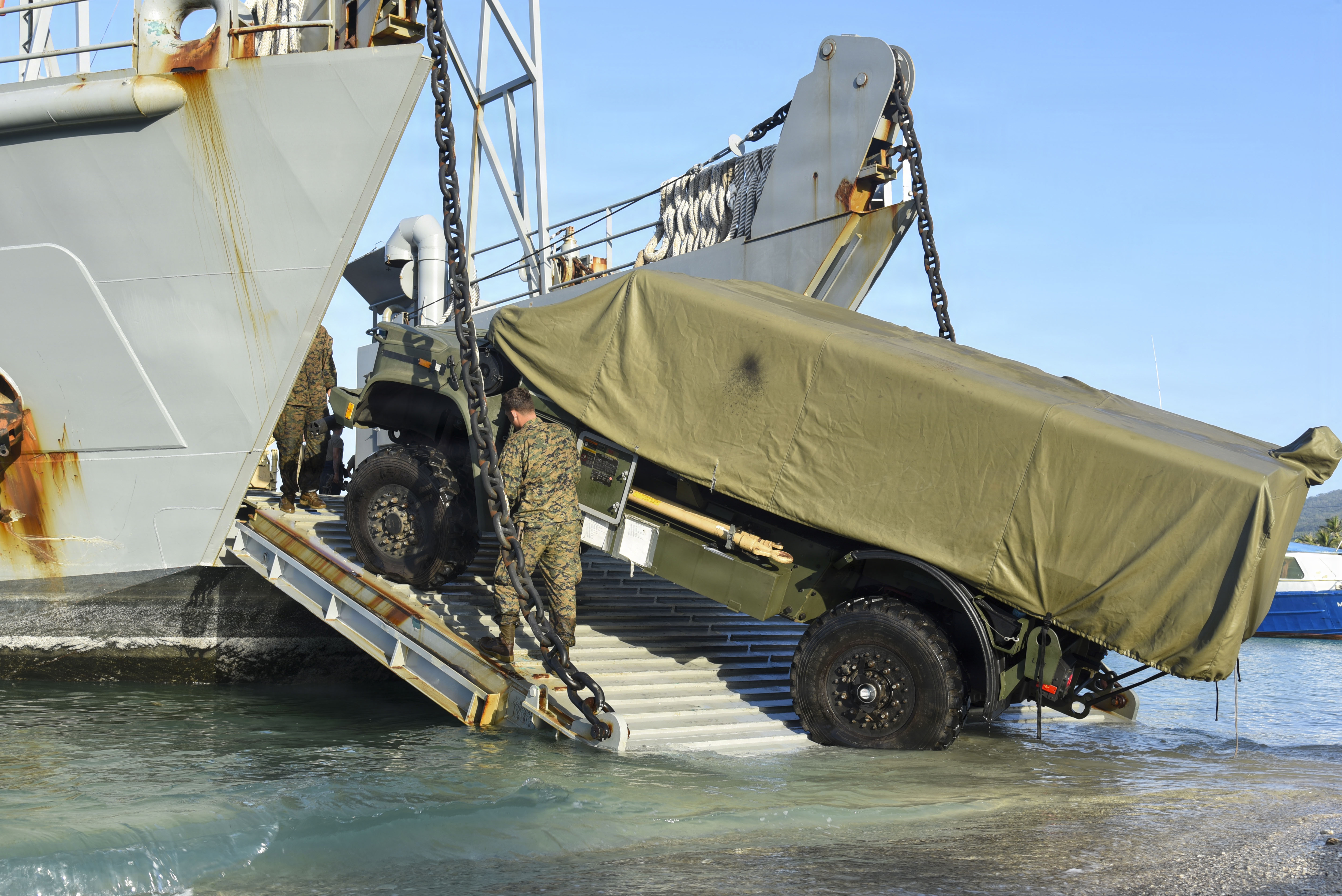 U.S. Marine Corps Lance Cpl. Bryzden Michener, a field artillery cannoneer assigned to 3rd Littoral Combat Team, 3rd Marine Littoral Regiment, 3rd Marine Division, operates a Navy-Marine Expeditionary Ship Interdiction System on to a U.S. Army Landing Craft Utility during Exercise Balikatan 2026 at Calayan, Cagayan, Philippines, May 2, 2026. Balikatan is a longstanding annual exercise between the Armed Forces of the Philippines and U.S. military that represents the strength of our alliance, improves our capable combined force, and demonstrates our commitment to regional peace and prosperity. Michener is a native of California. (U.S. Marine Corps photo by Cpl. Ernesto Lagunes)