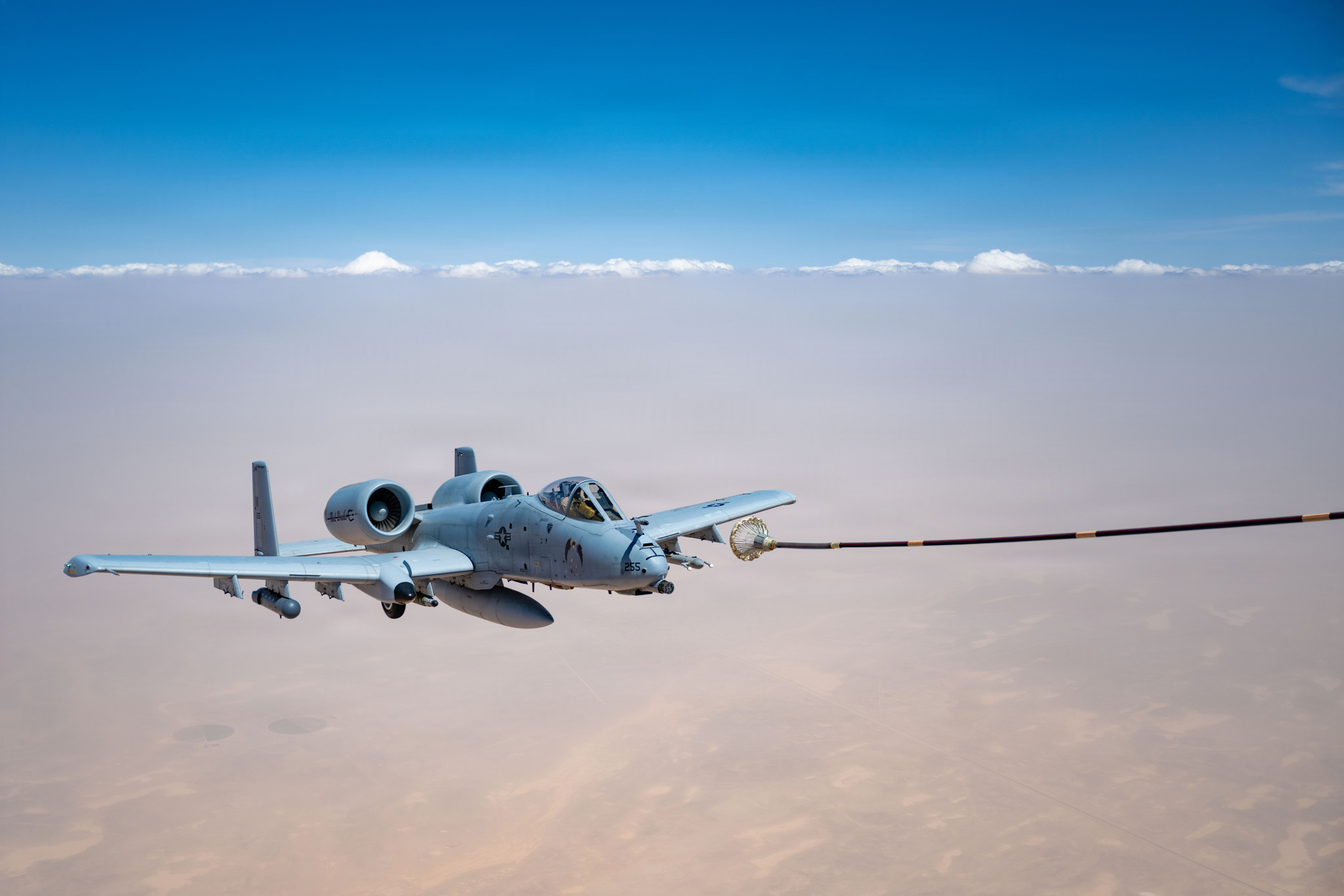 A U.S. Air Force A-10C Thunderbolt II aircraft approaches an HC-130J Combat King II aircraft for aerial refueling in the U.S. Central Command area of responsibility, May 9, 2026. (U.S. Air Force photo)