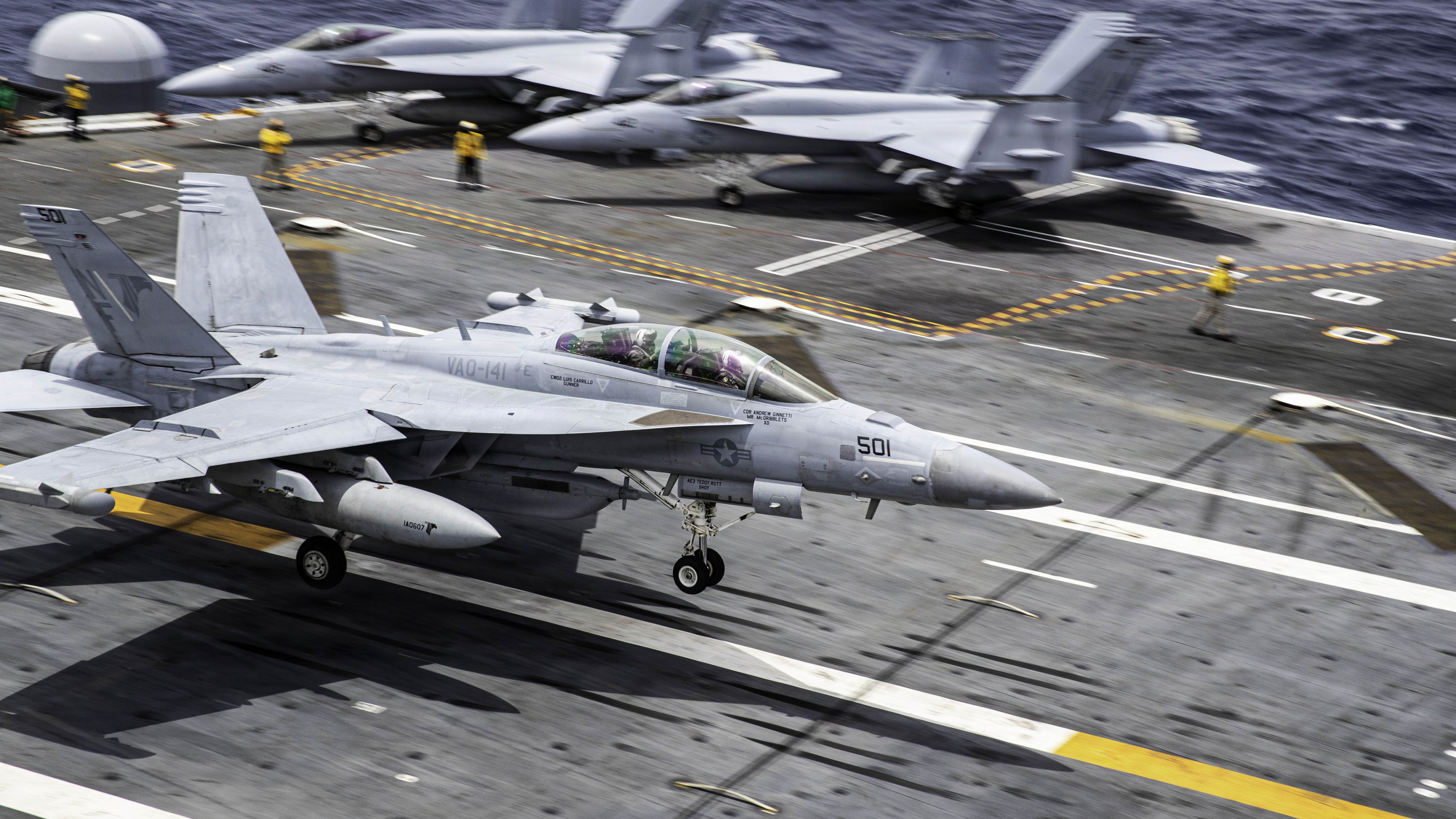 An F/A-18E Super Hornet, attached to Strike Fighter Squadron (VAQ) 141, lands on the flight deck of Nimitz-class aircraft carrier USS George Washington (CVN 73) while underway in the Philippines Sea, May 25, 2026. George Washington is the U.S. Navy’s premier forward-deployed aircraft carrier, a long-standing symbol of the United States’ commitment to maintaining a free and open Indo-Pacific region, while operating alongside allies and partners across the U.S. Navy’s largest numbered fleet. (U.S. Navy photo by Mass Communication Specialist Seaman Kiah Nesbitt)