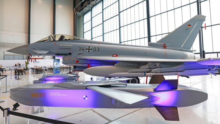 An Eurofighter (back) and a Taurus are seen during the Defence Summit 2026 at Airbus Defence and Space GmbH in Manching, Bavaria, southern Germany, on May 20, 2026.