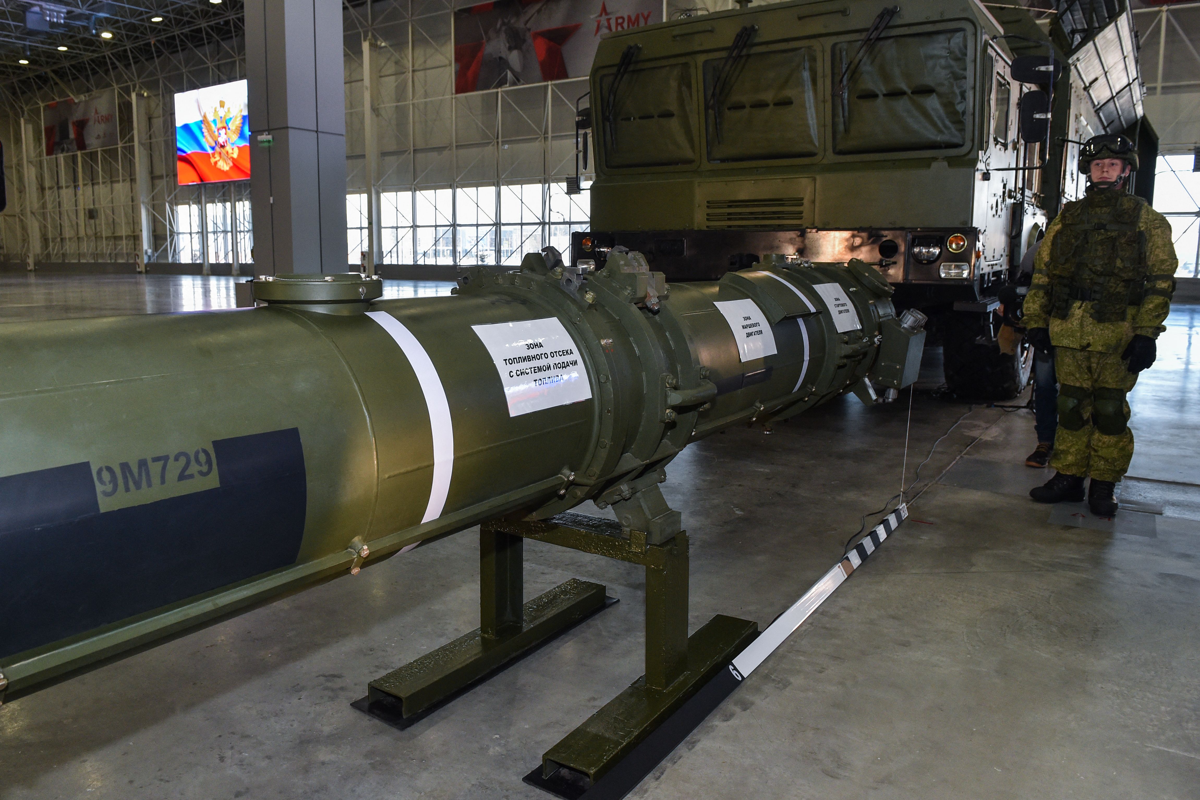 Russian Defence Ministry officials show off the Russia's 9M729 cruise missile at the military Patriot Park outside Moscow on January 23, 2019. Moscow on January 23, 2019 insisted the range of a missile system that has prompted Washington to say it will withdraw from a key Cold War arms treaty is allowed under the agreement. (Photo by Vasily MAXIMOV / AFP) (Photo by VASILY MAXIMOV/AFP via Getty Images)