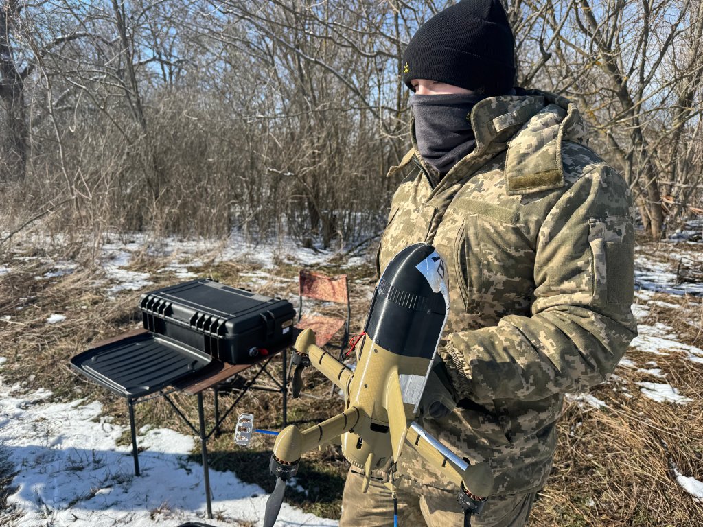 DNIPROPETROVSK OBLAST, UKRAINE - FEBRUARY 22: Ukrainian soldier holds interceptor drone Sting before a test flight on February 22, 2026 in Dnipropetrovsk Oblast, Ukraine. With the help of interceptor drones, the Ukrainian army shoots down Shaheds and Gerbers drones, which the Russian army launches over Ukraine. Interceptor drone can reach speeds of up to 300 kilometers and hit an air target at an altitude of 3 kilometers. The interceptor can be controlled using VR glasses or a small ground station. (Photo by Alex Nikitenko/Global Images Ukraine via Getty Images)
