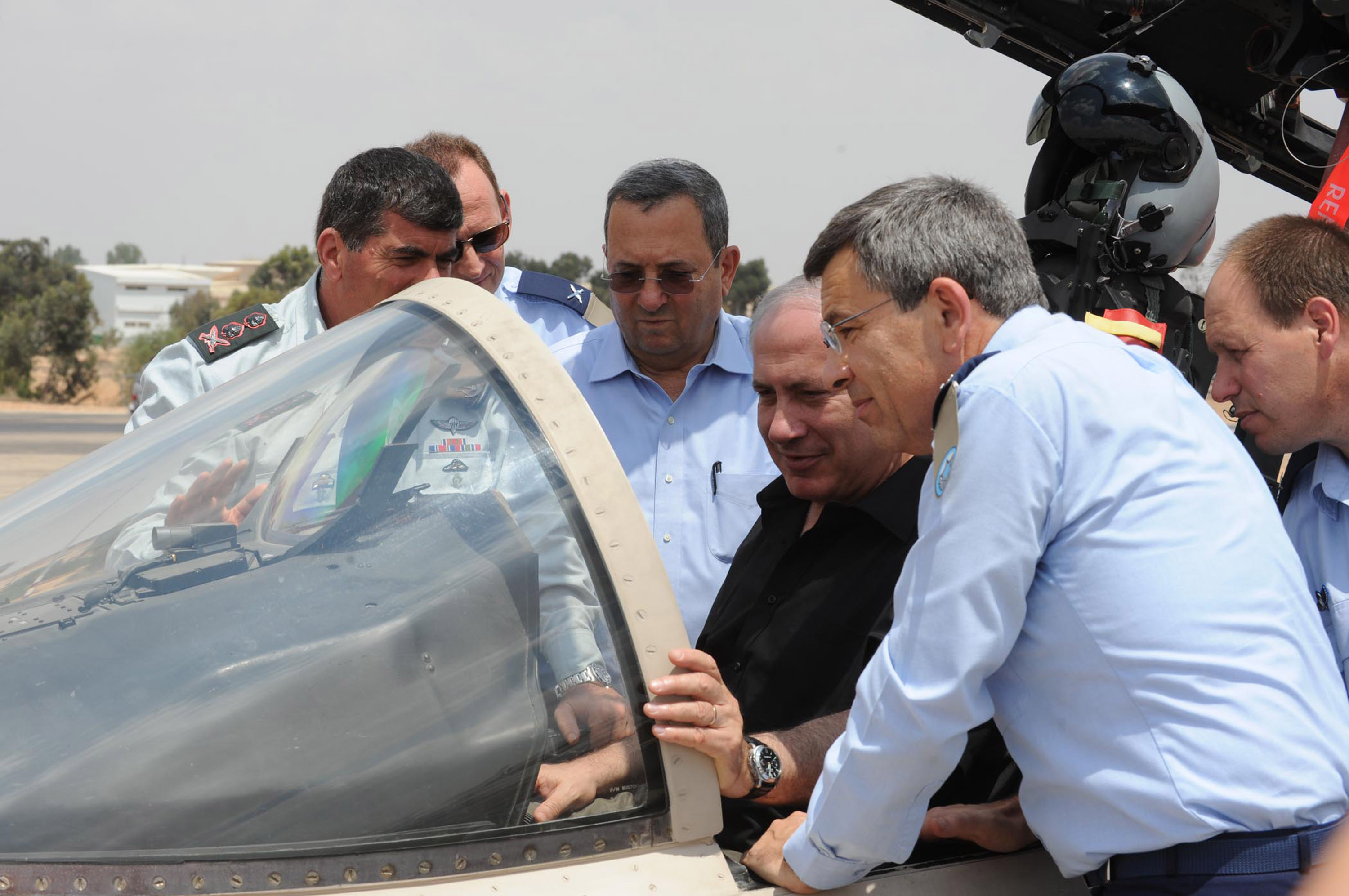 UNSPECIFIED, ISRAEL - AGUST 11: (ISRAEL OUT) In this handout image supplied by the Israeli Government Press Office (GPO), Israeli Prime Minister Benjamin Netanyahu, Defence Minister Ehud Barak and Chief of Staff Gabi Ashekenazy review an F-15 fighter jet during visit an Israeli Air Force base, on August 11, 2009 in Israel. (Photo by GPO via Getty Images)