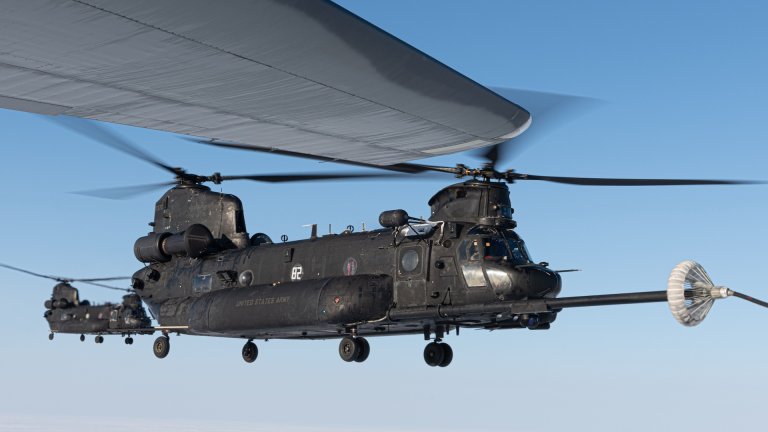 Two MH-47G Chinook helicopters assigned to the 160th Special Operations Aviation Regiment (Airborne), refuel mid-air during Arctic Edge 24 over the Arctic Ocean, Mar. 9, 2024. During AE24, more than 400 joint and allied Special Operators trained in extreme cold conditions to sharpen SOF readiness across unique specialties like long range fires and movements, special reconnaissance, rapid resupply, personnel recovery, and medical care in the austere Arctic environment. AE24 is a NORAD and U.S. Northern Command-led homeland defense exercise demonstrating the U.S. military’s capabilities in extreme cold weather, joint force readiness, and U.S. military commitment to mutual strategic security interests in the Arctic region.