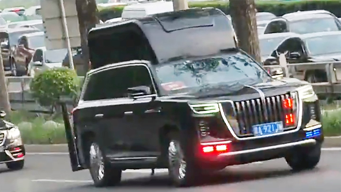 custon-high-top-suvs-stand-out-in-trump-motorcade-in-china.jpg