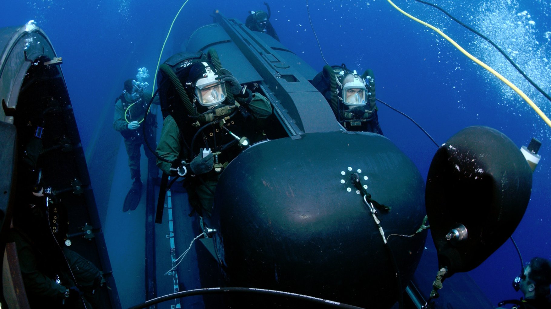 The U.S. Navy sees a future in which uncrewed underwater vehicles (UUV) work together with submersibles loaded with SEALs.