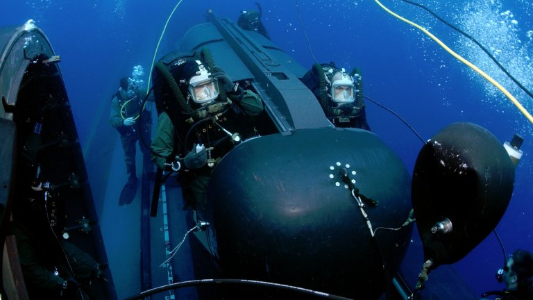 The U.S. Navy sees a future in which uncrewed underwater vehicles (UUV) work together with submersibles loaded with SEALs.