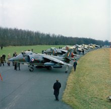 Pictured are six Pre-production Hawker Siddeley Harrier GR.1s pictured at the manufacturer's test facility at Dunsfold aerodrome, Surrey, in 1968. The first RAF squadron to be equipped with the Harrier GR.1, No. 1 Squadron, started to convert to the aircraft at RAF Wittering in April 1969. During the Harrier's service the RAF positioned the bulk of the aircraft in West Germany to defend against a potential invasion of Western Europe by the Warsaw Pact forces; the unique abilities of the Harrier allowed the RAF to disperse their forces away from vulnerable airbases. *Some of these images have had some dodging and burning done and have been retouched to remove detritus and dust and scratch marks only*