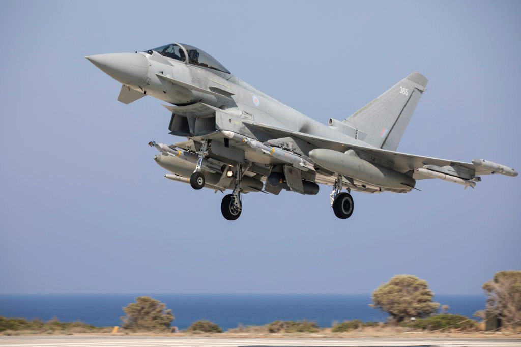 A Royal Air Force Typhoon fighter, part of 903 Expeditionary Air Wing deployed on Op SHADER, seen returning to RAF Akrotiri following a flight in the Middle East. Typhoon can carry a vast range of Air-to-Air and Air-to-Surface weapons, including the Storm Shadow conventionally armed stand-off missile, the Brimstone anti-armour weapon and laser guided bombs, as well as the Litening laser targeting and reconnaissance pod. The Typhoon FGR.Mk 4 is a highly capable and extremely agile fourth-generation multi-role combat aircraft, capable of being deployed for the full spectrum of air operations, including air policing, peace support and high-intensity conflict. The aircraft has a potent, precision multi-role capability. The pilot performs many essential functions through the aircraft’s hands on throttle and stick (HOTAS) interface which, combined with an advanced cockpit and the Helmet Equipment Assembly (HEA), renders Typhoon superbly equipped for all aspects of air operations. Although Typhoon has flown precision attack missions in all its combat deployments to date, its most essential role remains the provision of quick reaction alert (QRA) for UK and Falkland Islands airspace.