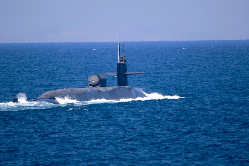 201221-N-IE405-4058 STRAIT OF HORMUZ (Dec. 21, 2020) The guided-missile submarine USS Georgia (SSGN 729) transits the Strait of Hormuz, Dec. 21. Georgia is deployed to the U.S. 5th Fleet area of operations in support of naval operations to ensure maritime stability and security in the Central Region, connecting the Mediterranean and Pacific through the Western Indian Ocean and three critical chokepoints to the free flow of global commerce. (U.S. Navy photo by Mass Communication Specialist 2nd Class Indra Beaufort/Release)