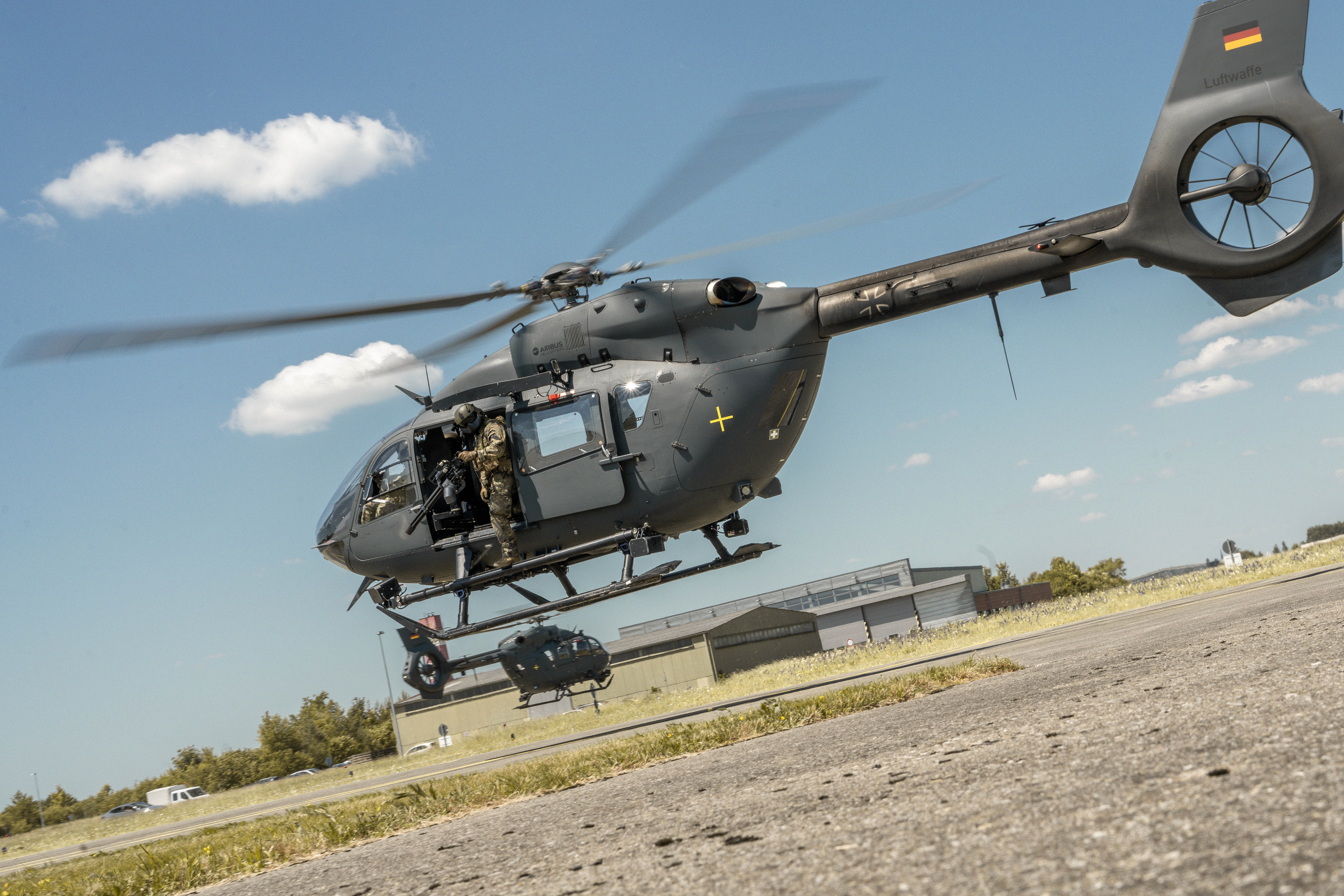 German air force special forces members take off from Lechfeld Air Base, Germany aboard an H145M Airbus aircraft during exercise Air Defender 2023 (AD23), June 14, 2023. Exercise AD23 integrates both U.S. and allied air-power to defend shared values, while leveraging and strengthening vital partnerships to deter aggression around the world. (U.S. Air National Guard photo by Staff Sgt. Joseph R. Morgan)