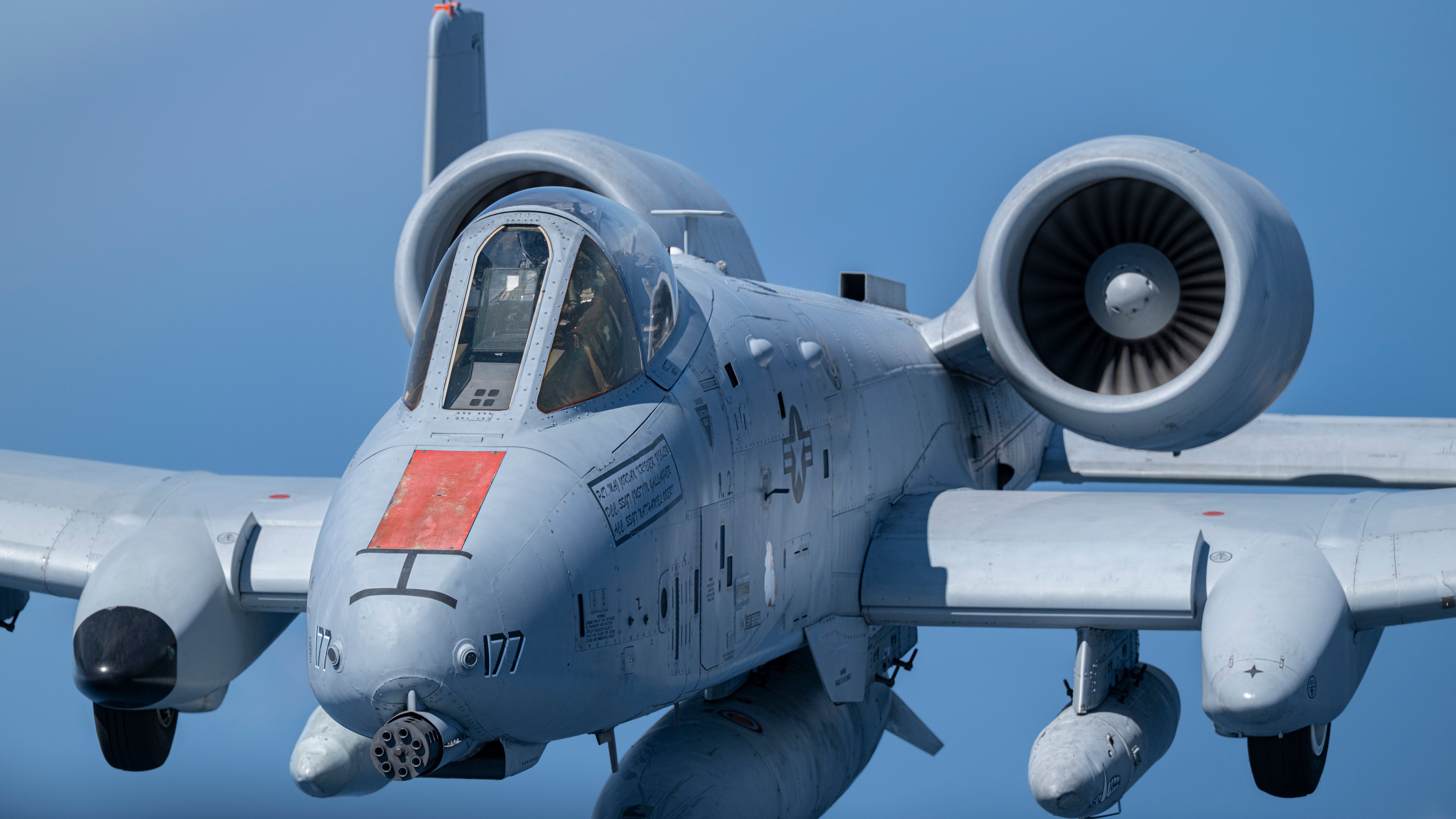 A U.S. Air Force A-10C Thunderbolt II flies over the Gulf of America, September 16, 2025. The A-10, from Detachment 1, 40th Flight Test Squadron at Davis-Monthan Air Force Base, Arizona, has an orange nose panel to represent an area or part of the aircraft that is undergoing test operations. (U.S. Air Force photo by Tech Sgt. Jacob Stephens)