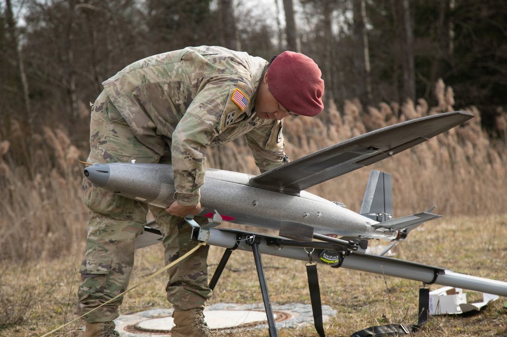 U.S. Soldier Sgt. Kevin Tran, assigned to 173rd Airborne Brigade, sets up a one-way attack Hornet drone during a demonstration in the 7th Army Training Command’s Grafenwoehr Training Area, Germany, March 25, 2026. The demonstration provided leaders with insight into how AI-enabled one-way attack systems operate alongside Army fires formations. (U.S. Army photo by Spc. Thomas Dixon)