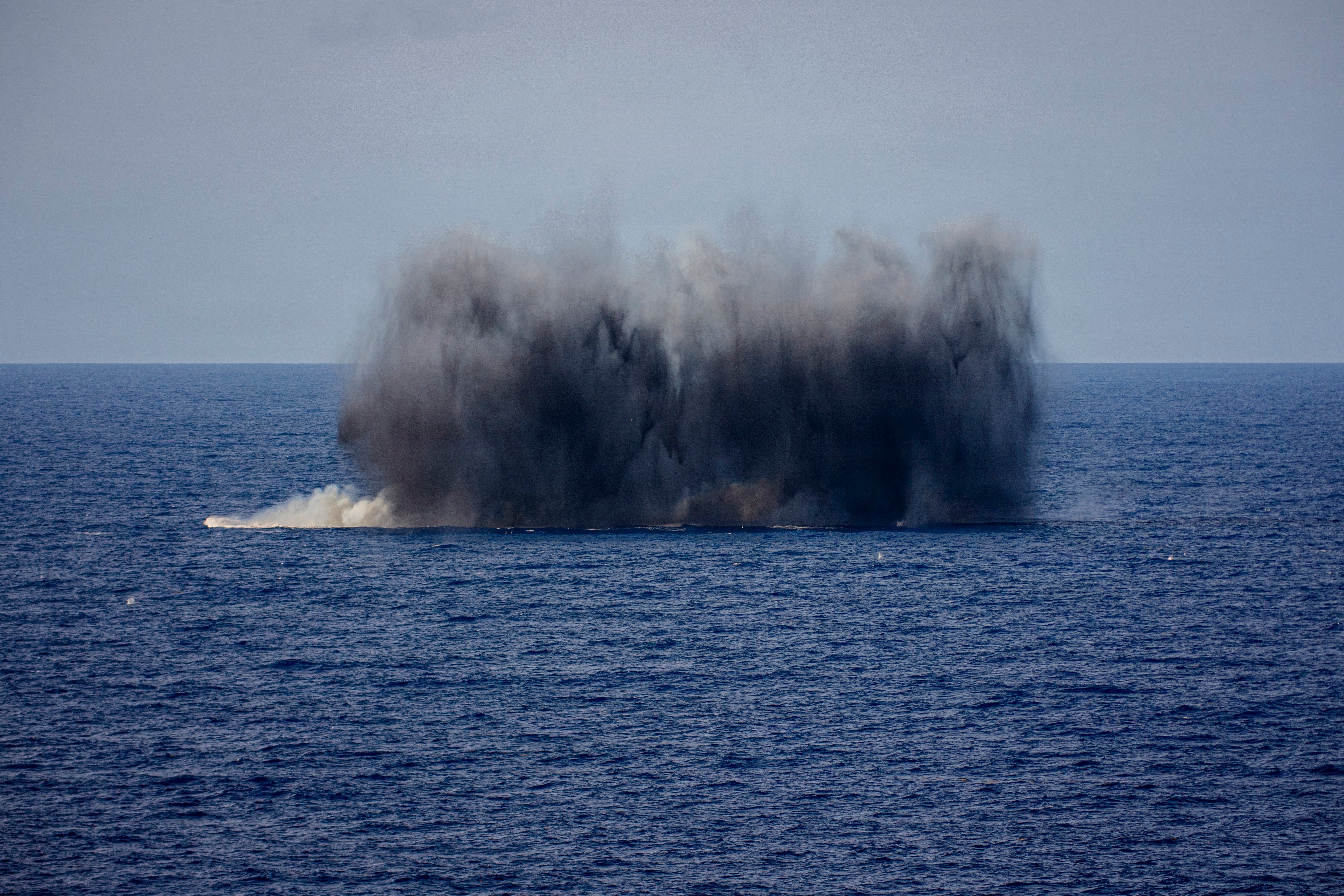 A MK12/BLU-111 aircraft bomb hits a simulated target during an air power demonstration over the Gulf of America, June 11, 2026. U.S. military forces are deployed to the U.S. Southern Command area of responsibility in support of Department of War-directed operations, and the president's priorities to disrupt illicit drug trafficking, deter malign actors and protect the homeland through continuous presence. Nimitz-class aircraft carriers are the pinnacle of mobile naval air power projection and forward operational presence. No other weapons system possesses the responsiveness, endurance, multi-dimensional might, inherent battlespace awareness, and command and control capabilities of a carrier strike group and its embarked air wing. (U.S. Navy photo / Released)