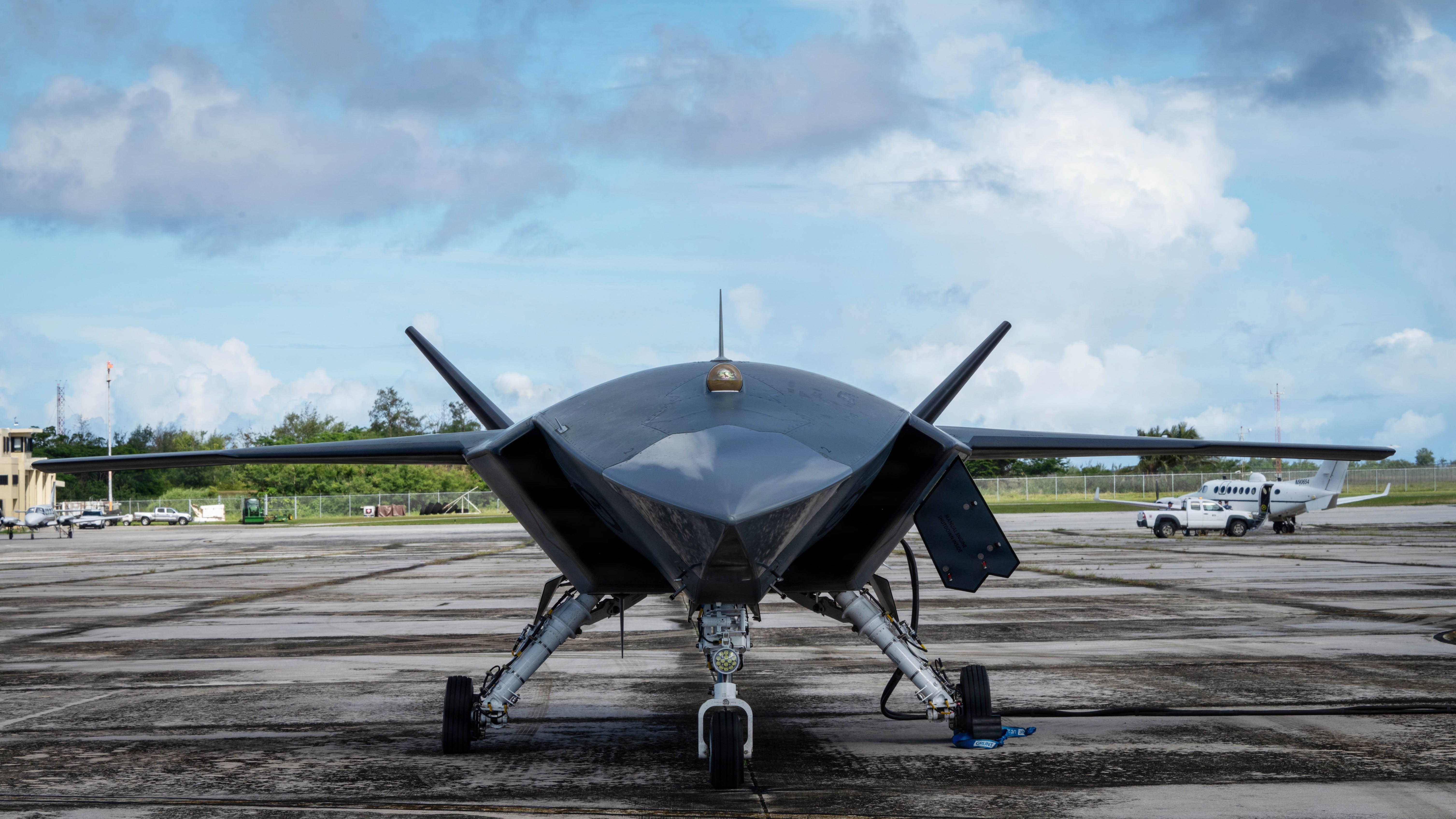 A Boeing Defence Australia’s MQ-28 Ghost Bat, a production representative test aircraft, undergoes preflight checks during Exercise Valiant Shield 2026 at Rota, Commonwealth of the Northern Mariana Islands, June 21, 2026. During the exercise, the uncrewed MQ-28 will fly in concert with crewed fighter platforms. (U.S. Air Force photo by Senior Airman Adrien Tran)