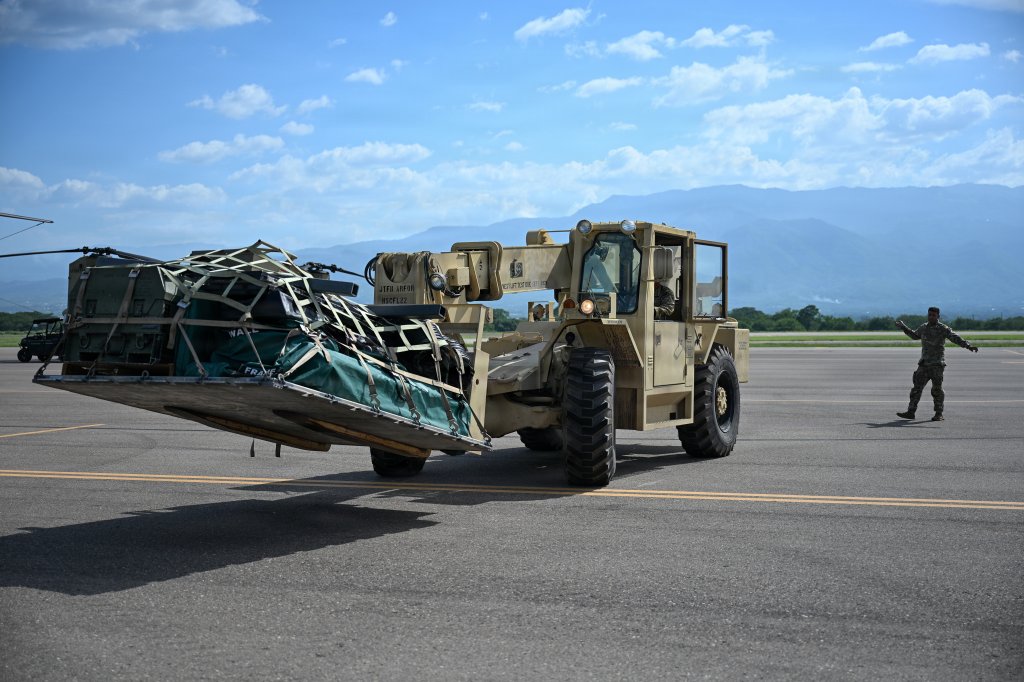 Members of Joint Task Force-Bravo load equipment into a CH-47 Chinook in preparation for potential support to Venezuela's disaster relief response at Soto Cano Air Base, Honduras, June 25, 2026. At the direction of U.S. Southern Command, assigned U.S. military forces are supporting Department of State-led U.S. disaster assistance to the people of Venezuela in the aftermath of the June 24, 2026, earthquakes. (U.S. Air Force photo by Staff Sgt. Ethan Sherwood)