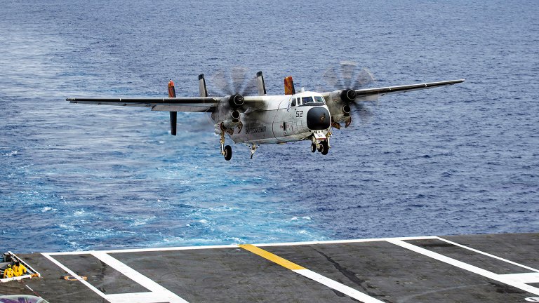 A C-2A Greyhound, attached to the “Rawhides” of Fleet Logistics Support Squadron 40, approaches Nimitz-class aircraft carrier USS Nimitz (CVN 68) while making the last ever arrested landing by a Greyhound on a U.S. Navy aircraft carrier in the Atlantic Ocean, June 25, 2026. Nimitz is underway taking part in Fleet Exercise (FLEETEX) 250, a series of structured multilateral training events at-sea, aimed at building cohesiveness, validating tactical procedures, and strengthening the interoperability of participating units—which include warships, aircraft, and crews from the U.S. and 13 partner and allied nations. (U.S. Navy photo by Mass Communication Specialist 2nd Class Peter K. McHaddad)