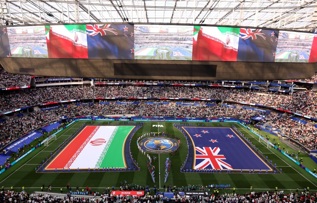 LOS ANGELES, CALIFORNIA - JUNE 15: Players and match officials walk into the pitch before the FIFA World Cup 2026 Group G match between IR Iran and New Zealand at Los Angeles Stadium on June 15, 2026 in Los Angeles, California. (Photo by Stu Forster/Getty Images)